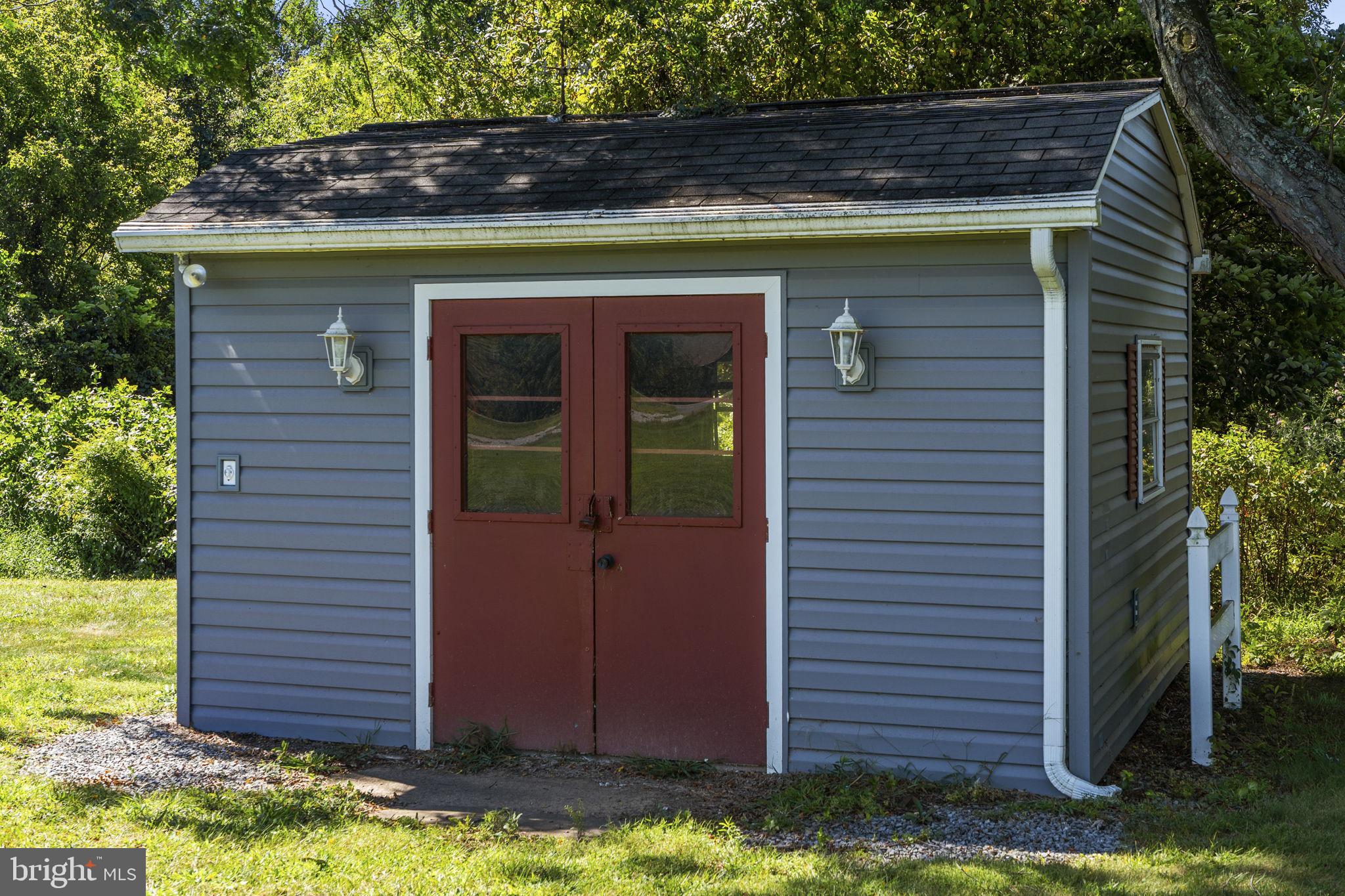 462 Sawmill Road New Providence, PA 17560 - Photo 6 of 26 a front view of a house with a yard