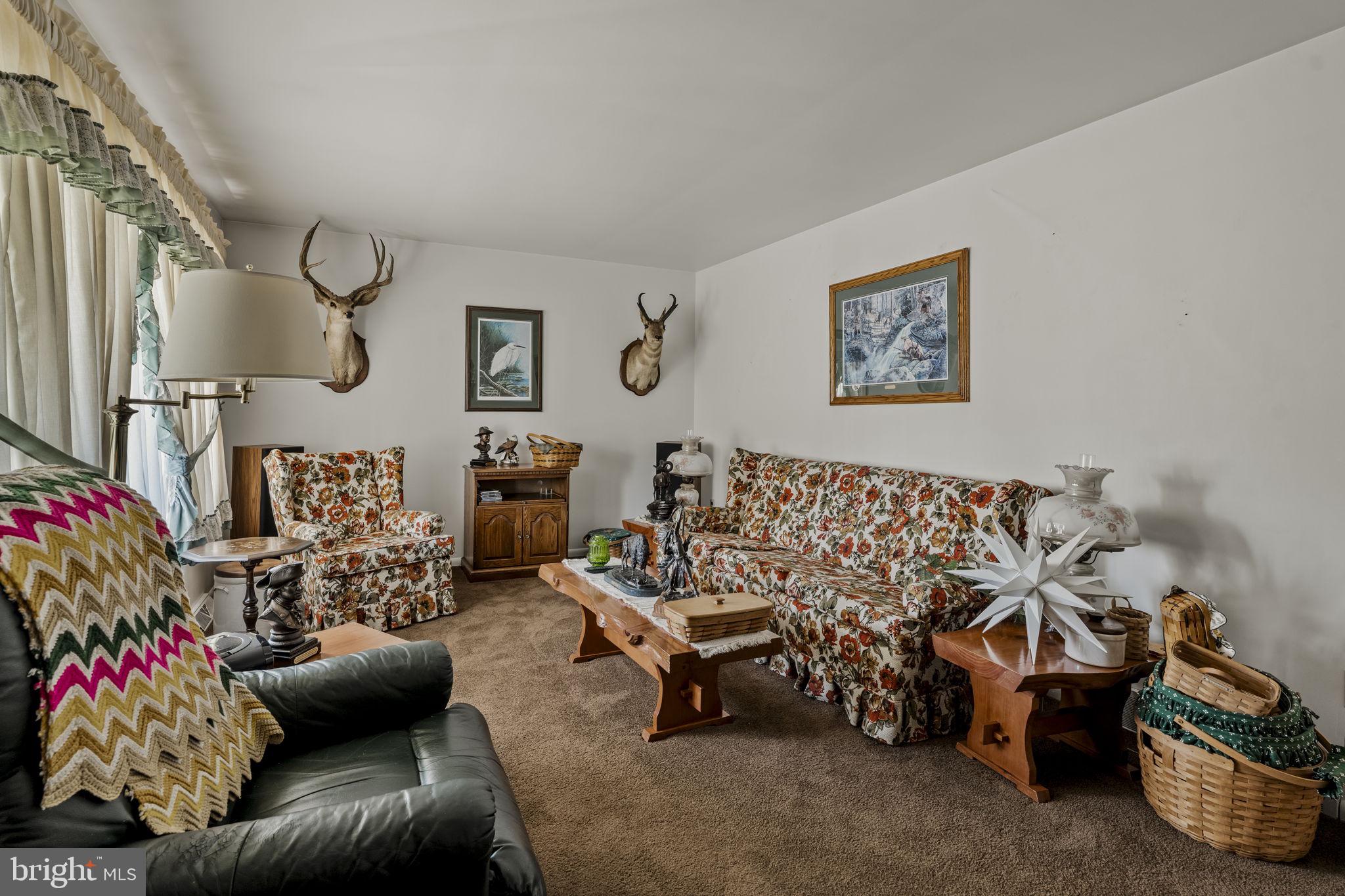 462 Sawmill Road New Providence, PA 17560 - Photo 7 of 26 a living room with furniture and a couch