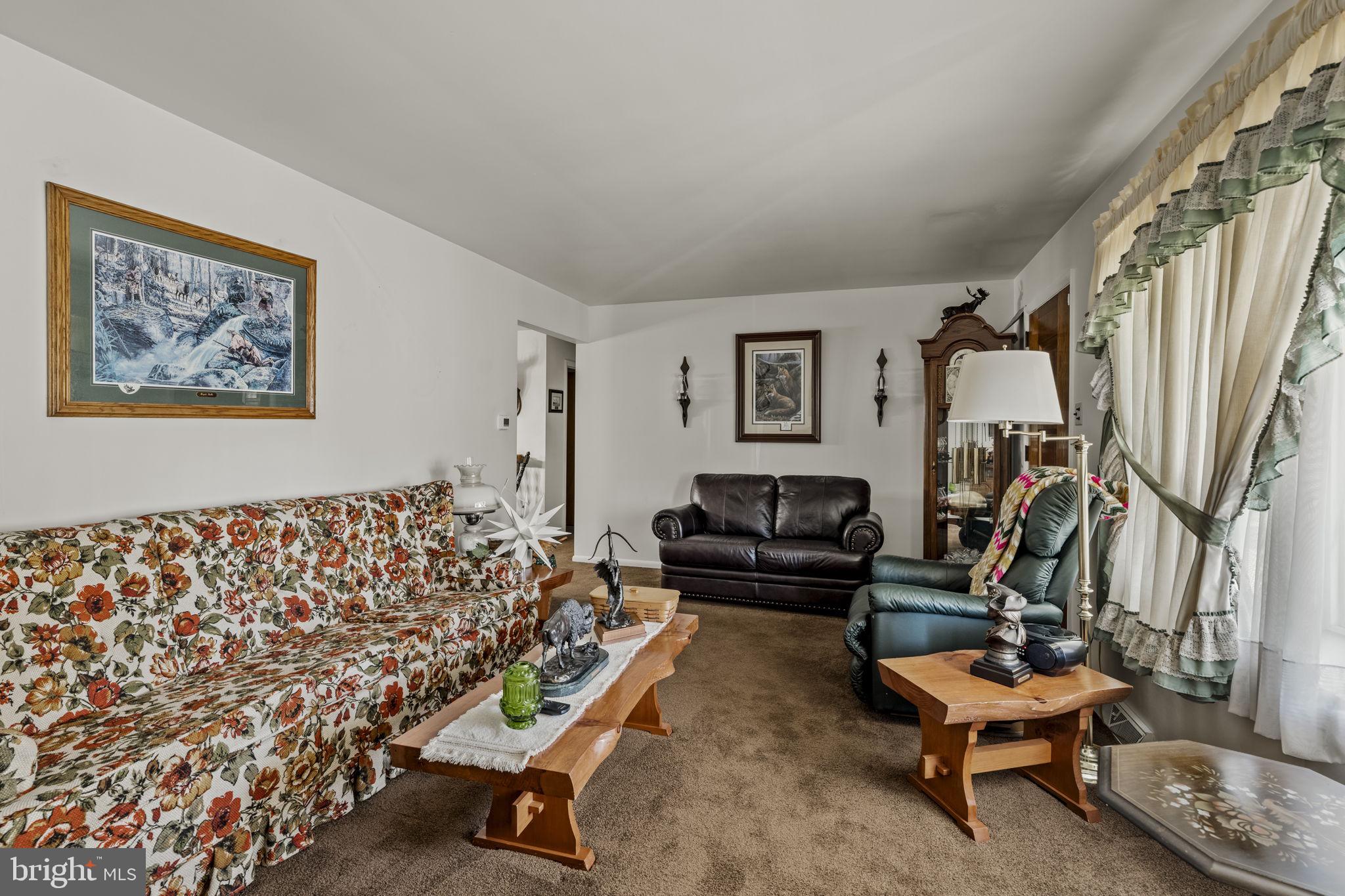 462 Sawmill Road New Providence, PA 17560 - Photo 9 of 26 a living room with furniture and a rug