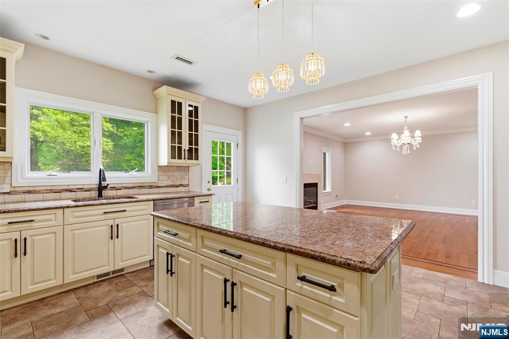 767 Orangeburgh Road River Vale, NJ 07675 - Photo 13 of 49 a kitchen with sink stove and refrigerator