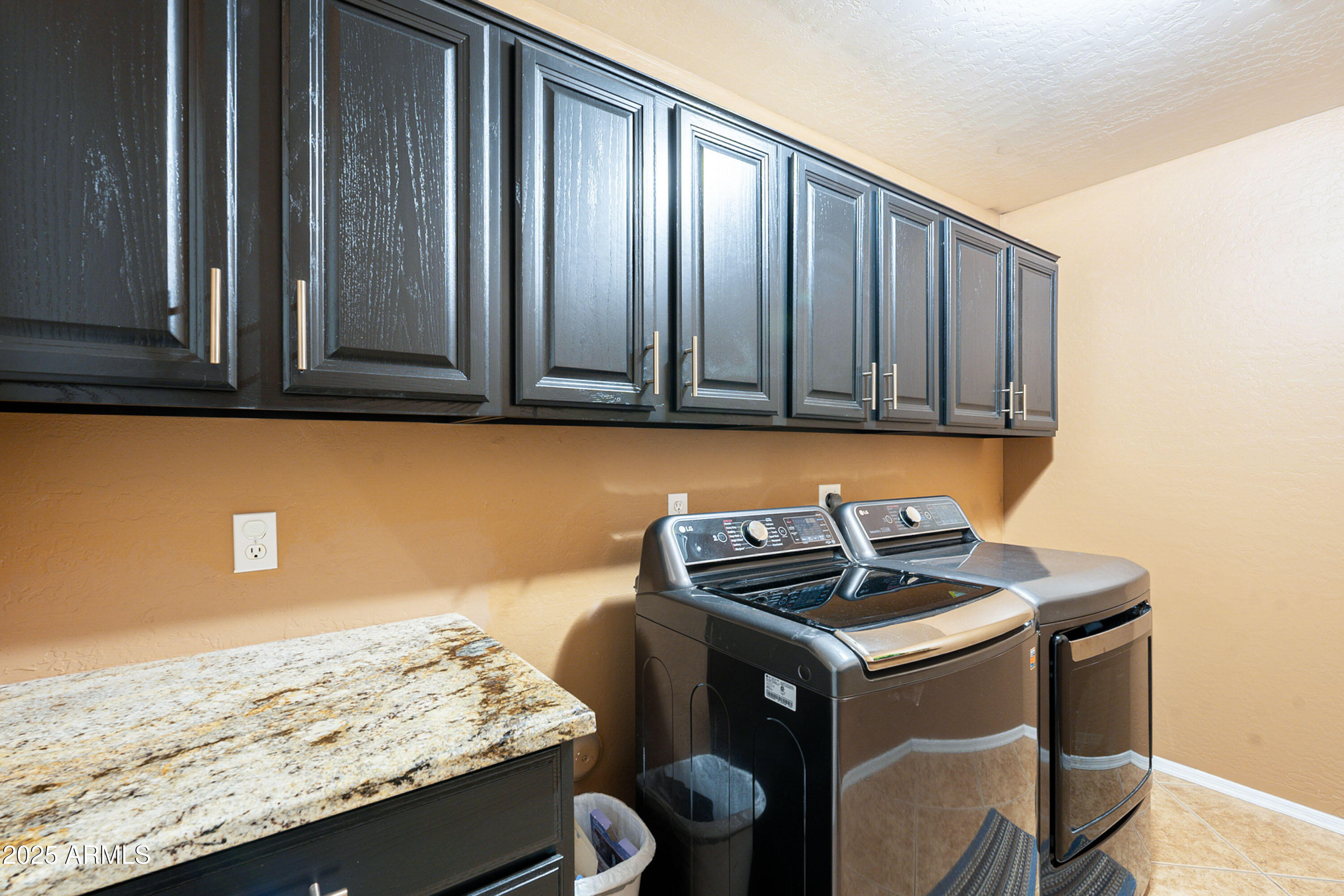 3464 North Ashbrook Mesa, AZ 85213 - Photo 14 of 63 a kitchen with granite countertop cabinets stove and oven