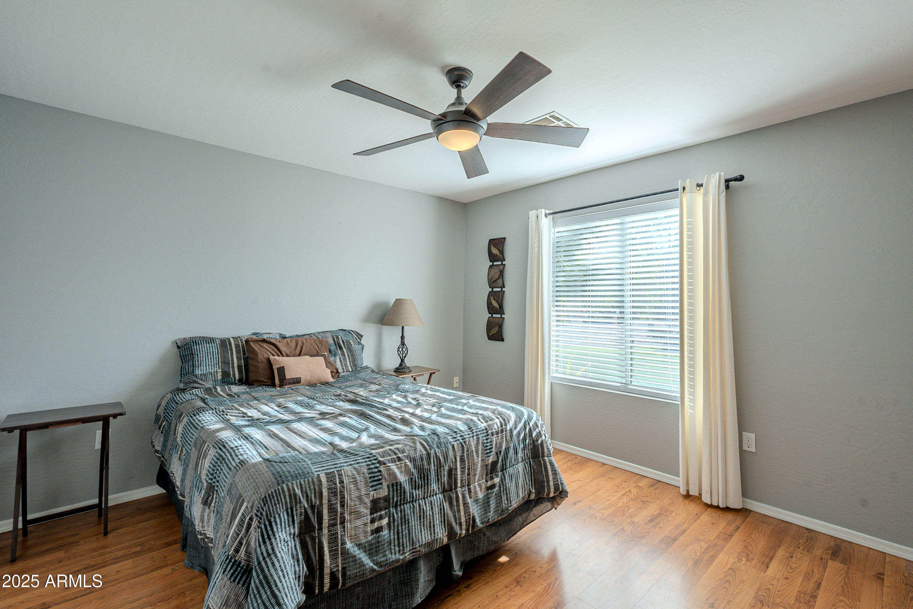 3464 North Ashbrook Mesa, AZ 85213 - Photo 21 of 63 a bedroom with a bed and window