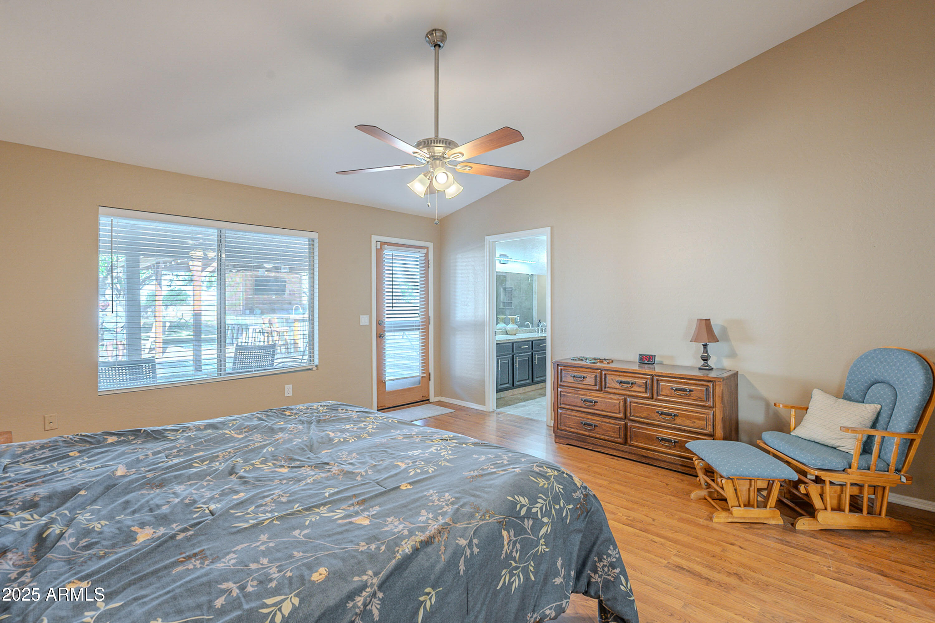 3464 North Ashbrook Mesa, AZ 85213 - Photo 24 of 63 a bedroom with a bed and wooden floor
