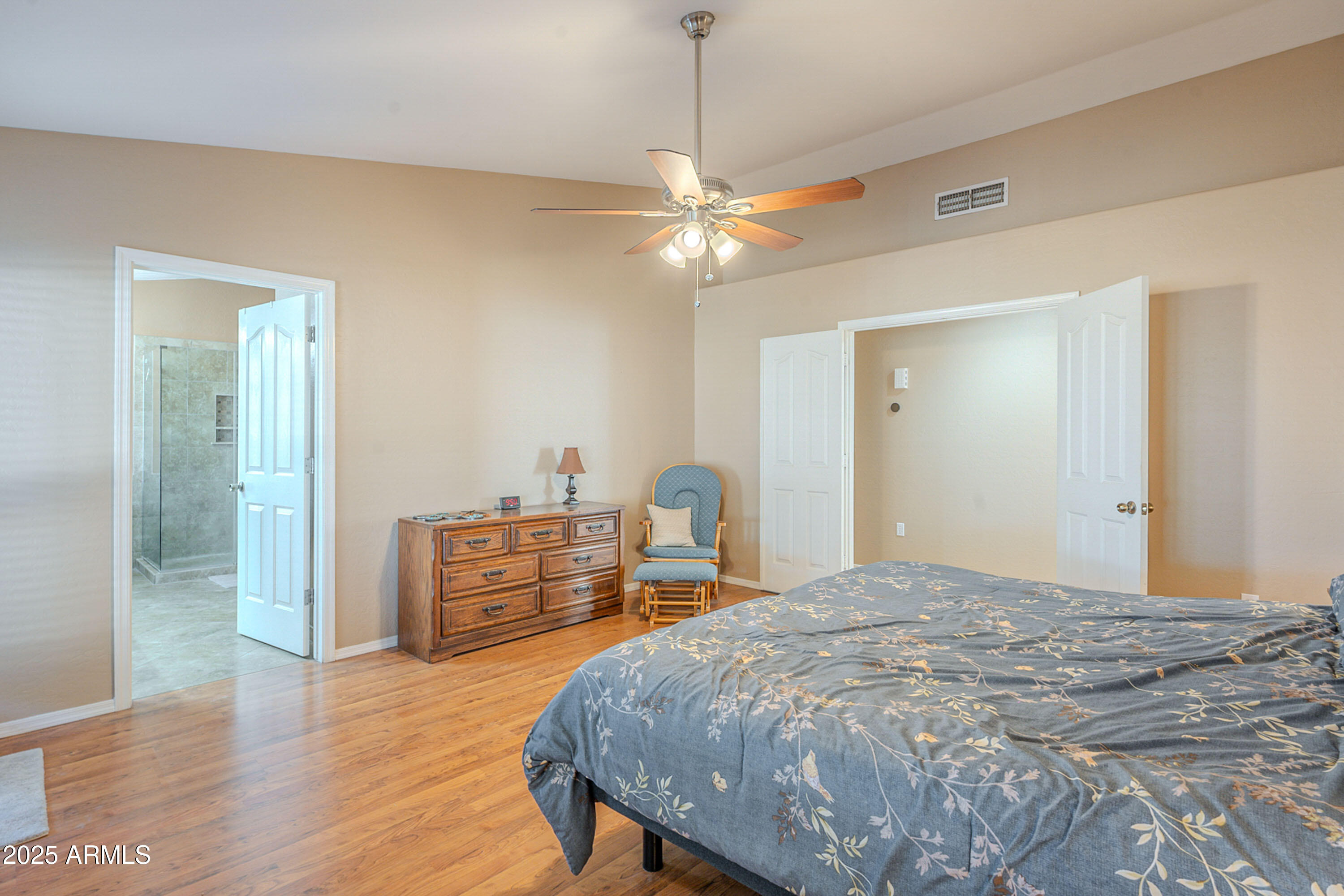 3464 North Ashbrook Mesa, AZ 85213 - Photo 25 of 63 a bedroom with a bed and wooden floor