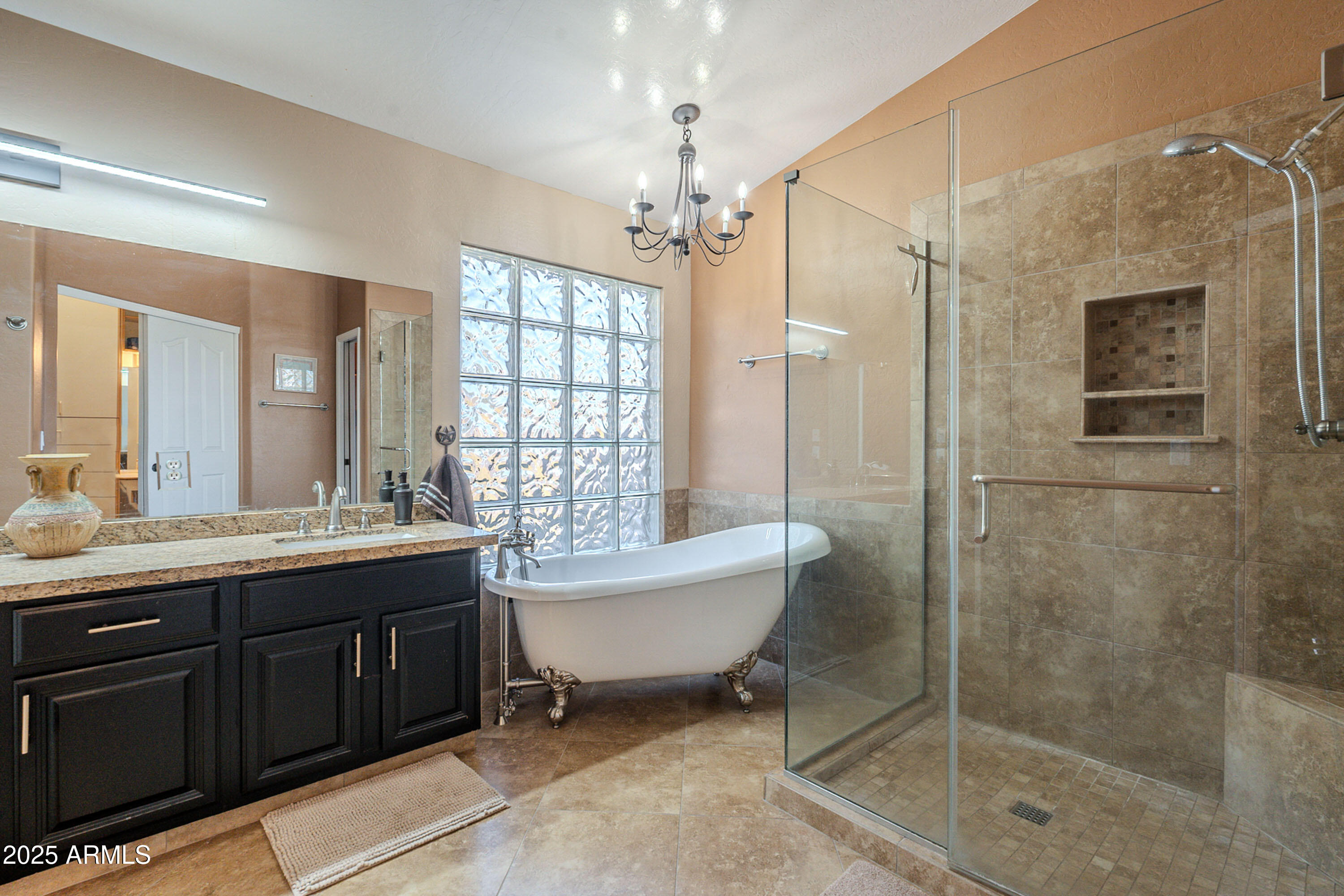 3464 North Ashbrook Mesa, AZ 85213 - Photo 27 of 63 a bathroom with a bathtub shower sink mirror and toilet