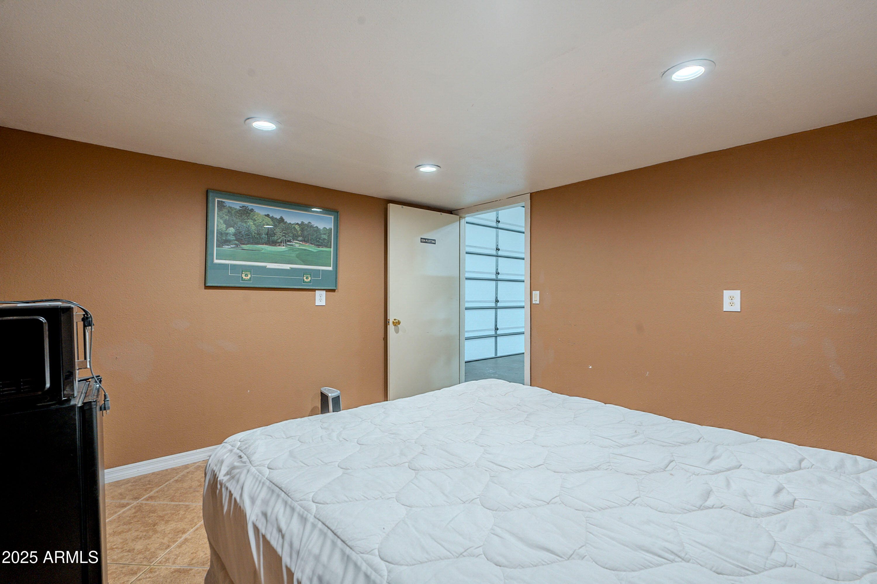 3464 North Ashbrook Mesa, AZ 85213 - Photo 37 of 63 a bedroom with a bed and a painting