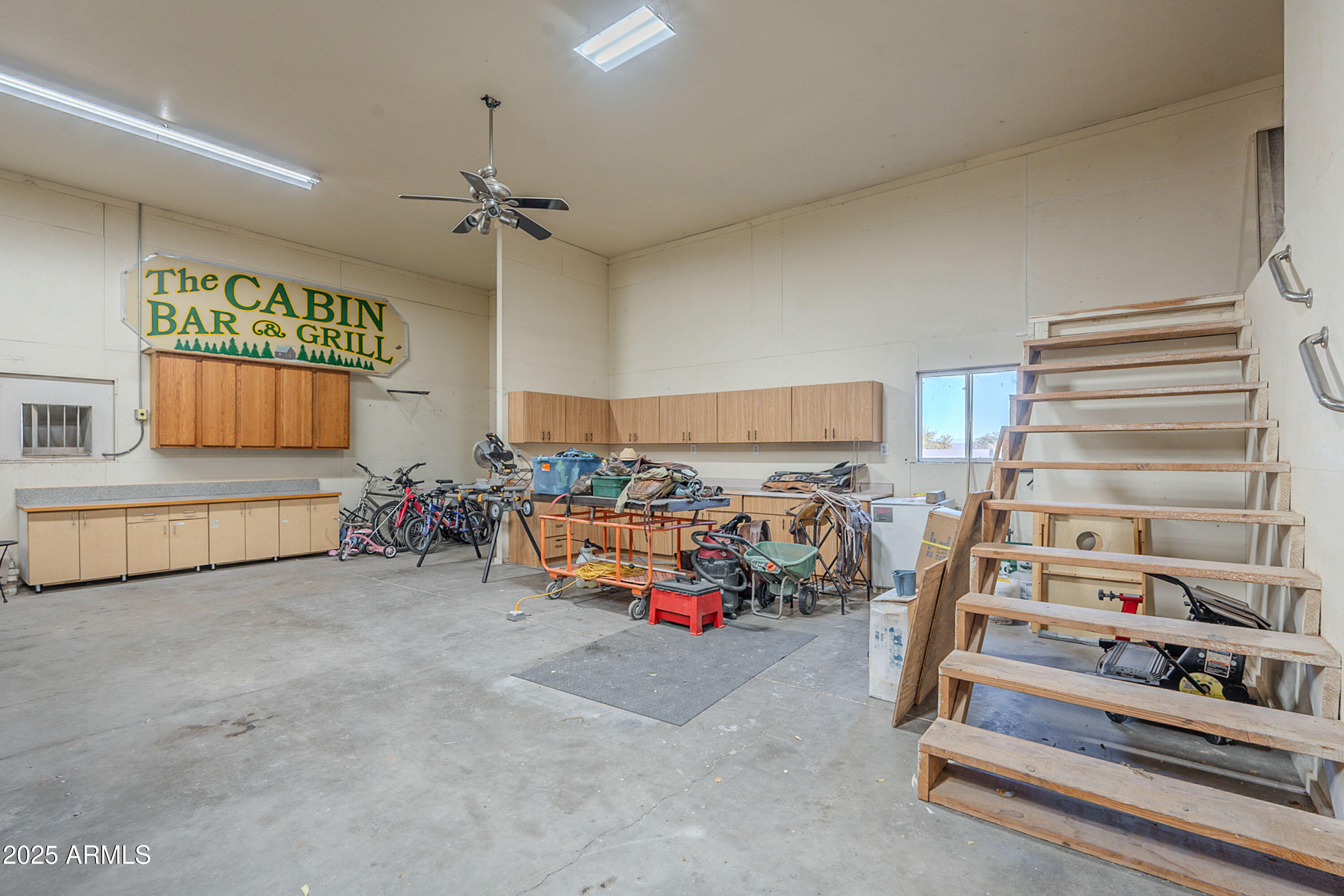 3464 North Ashbrook Mesa, AZ 85213 - Photo 39 of 63 a view of a livingroom with furniture and a ceiling fan