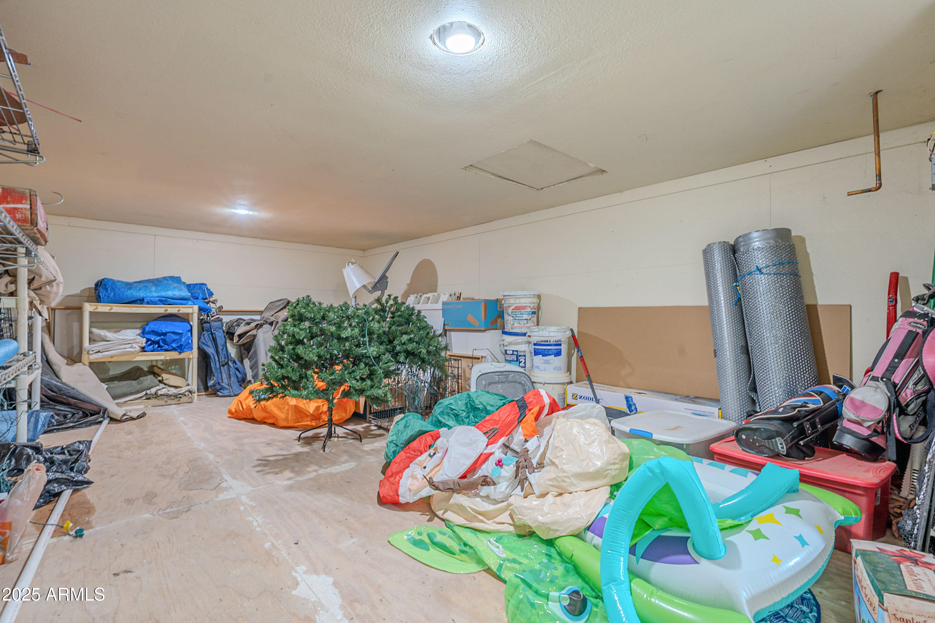 3464 North Ashbrook Mesa, AZ 85213 - Photo 40 of 63 a room with toys and couches with wooden floor