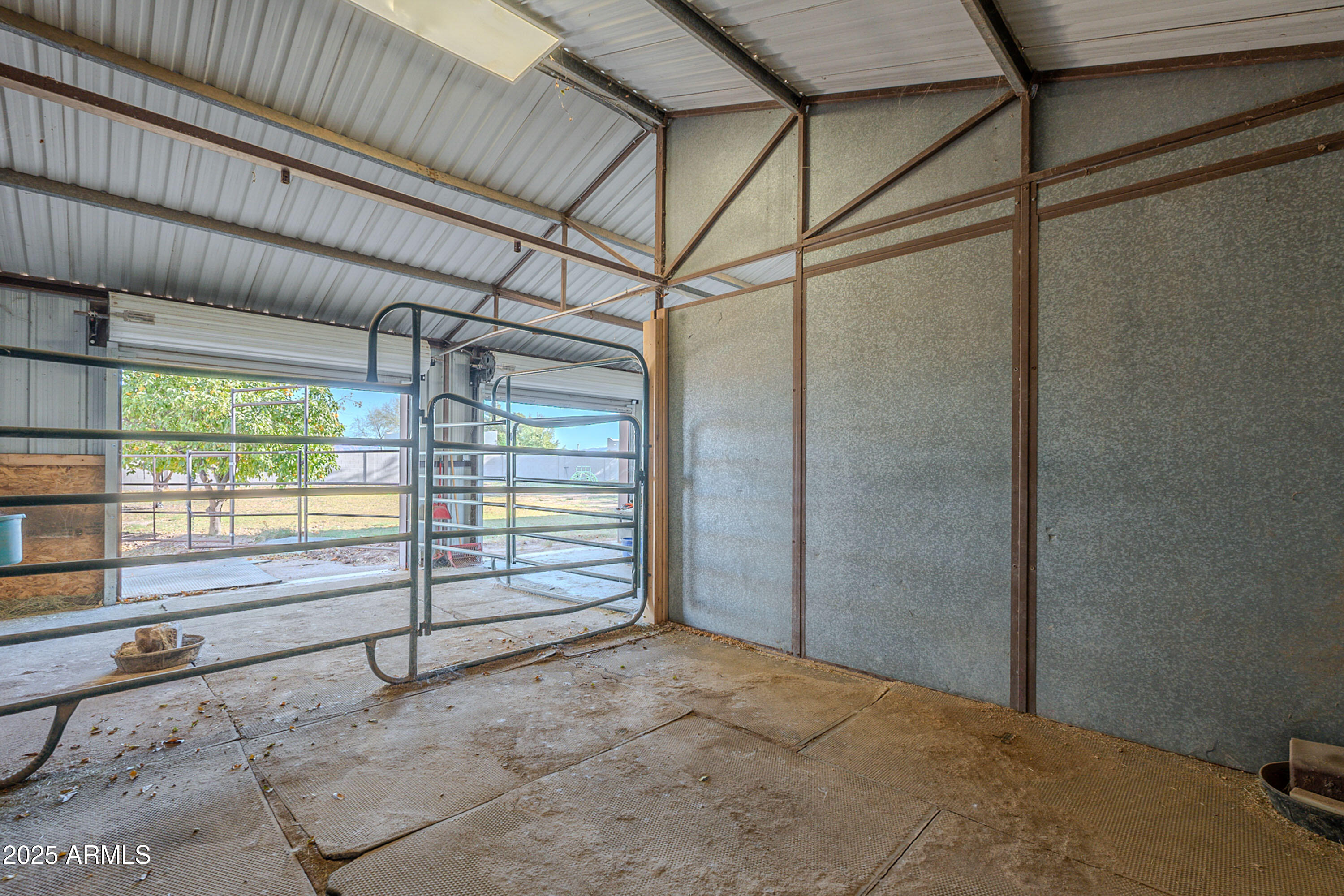 3464 North Ashbrook Mesa, AZ 85213 - Photo 44 of 63 a view of a room with racks on the wall