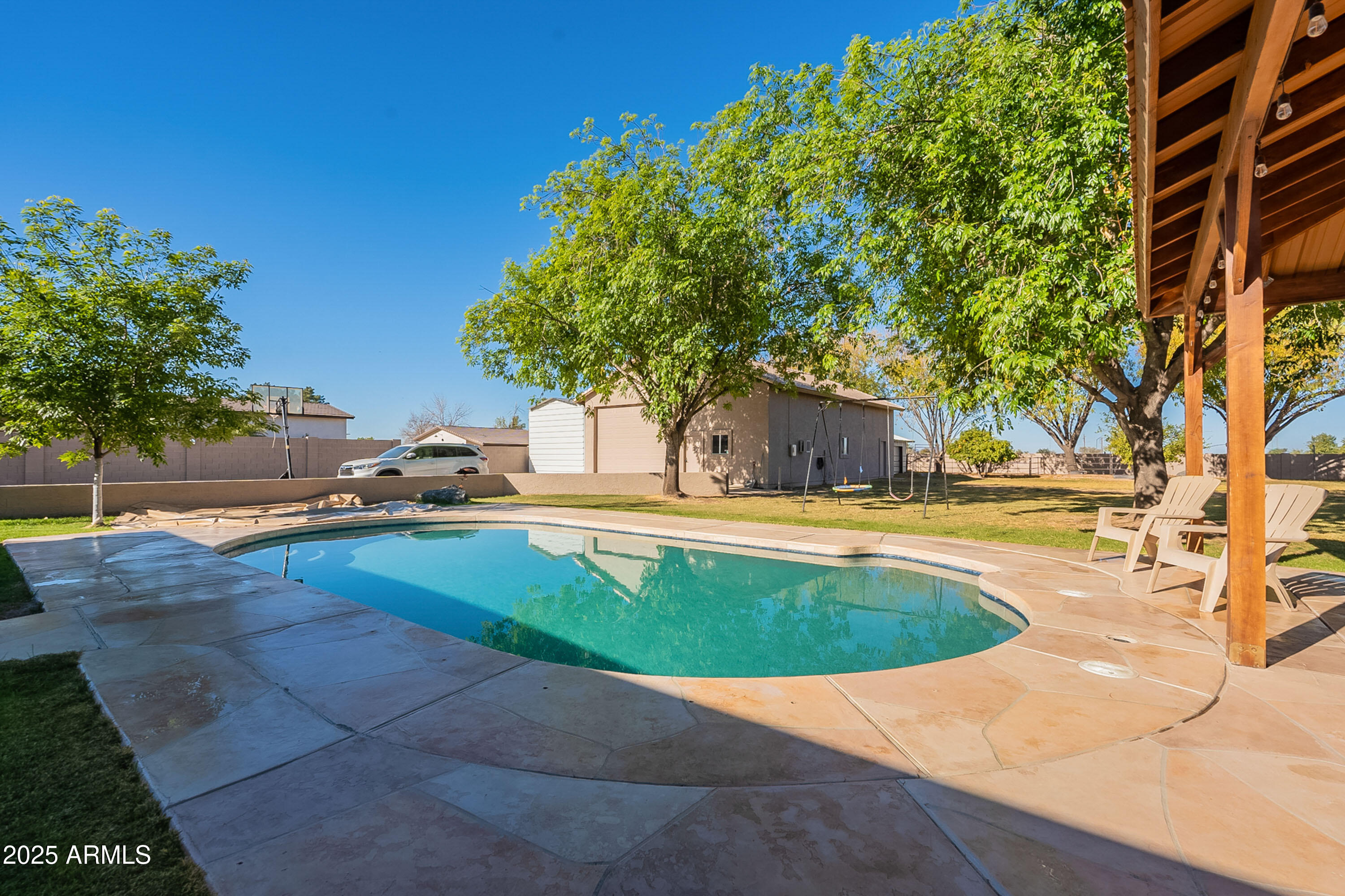 3464 North Ashbrook Mesa, AZ 85213 - Photo 54 of 63 a view of outdoor space yard swimming pool and sitting area