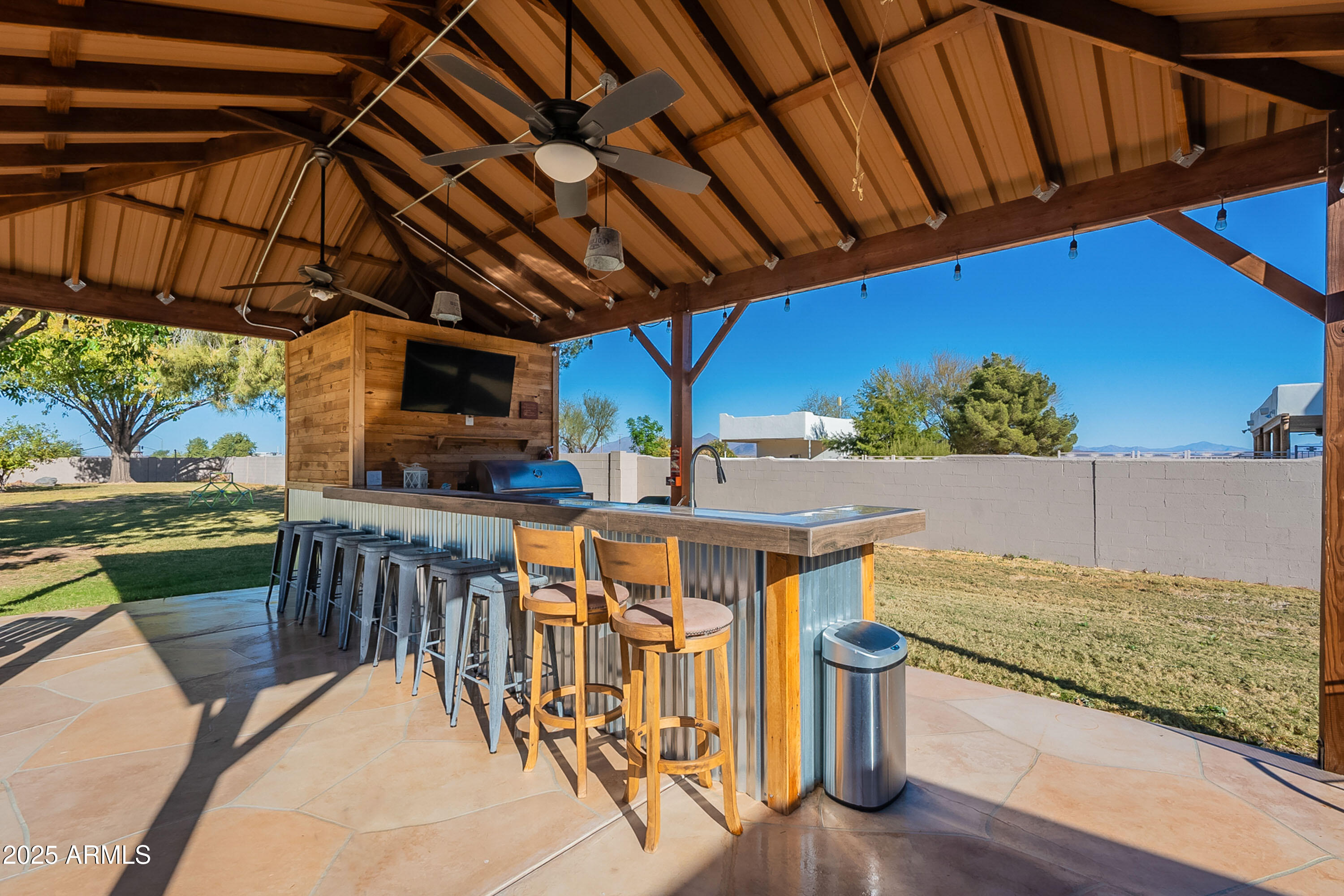 3464 North Ashbrook Mesa, AZ 85213 - Photo 55 of 63 a view of a chairs and table in the patio
