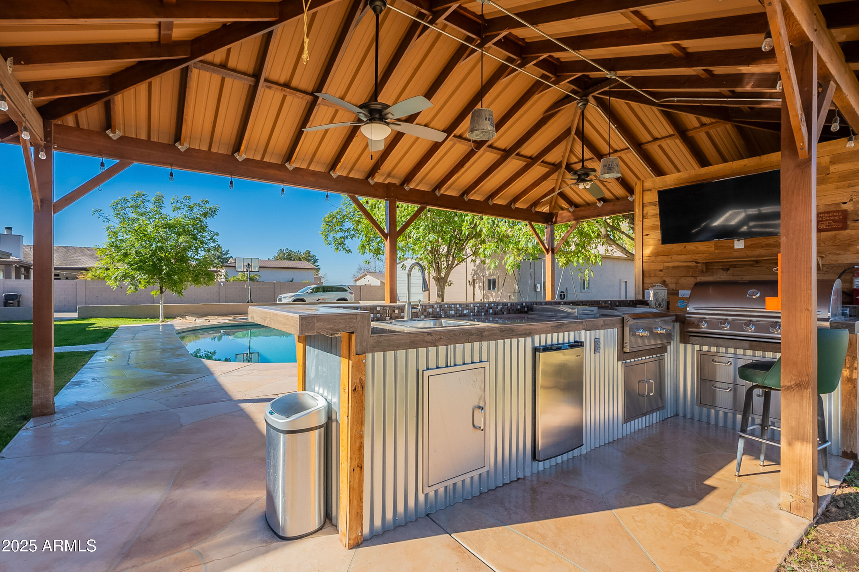 3464 North Ashbrook Mesa, AZ 85213 - Photo 56 of 63 a view of a swimming pool with a patio