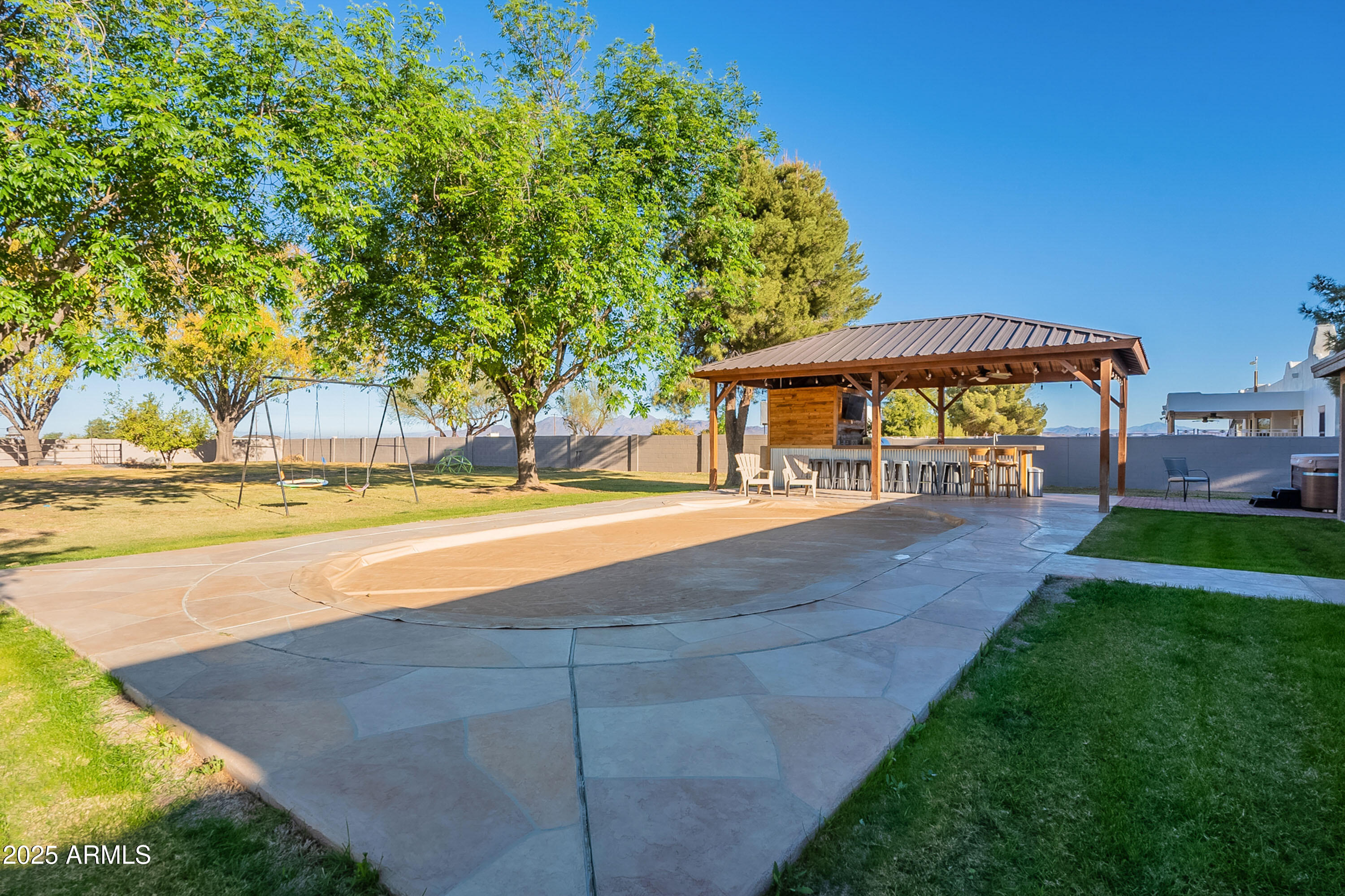3464 North Ashbrook Mesa, AZ 85213 - Photo 60 of 63 a view of outdoor space yard and swimming pool