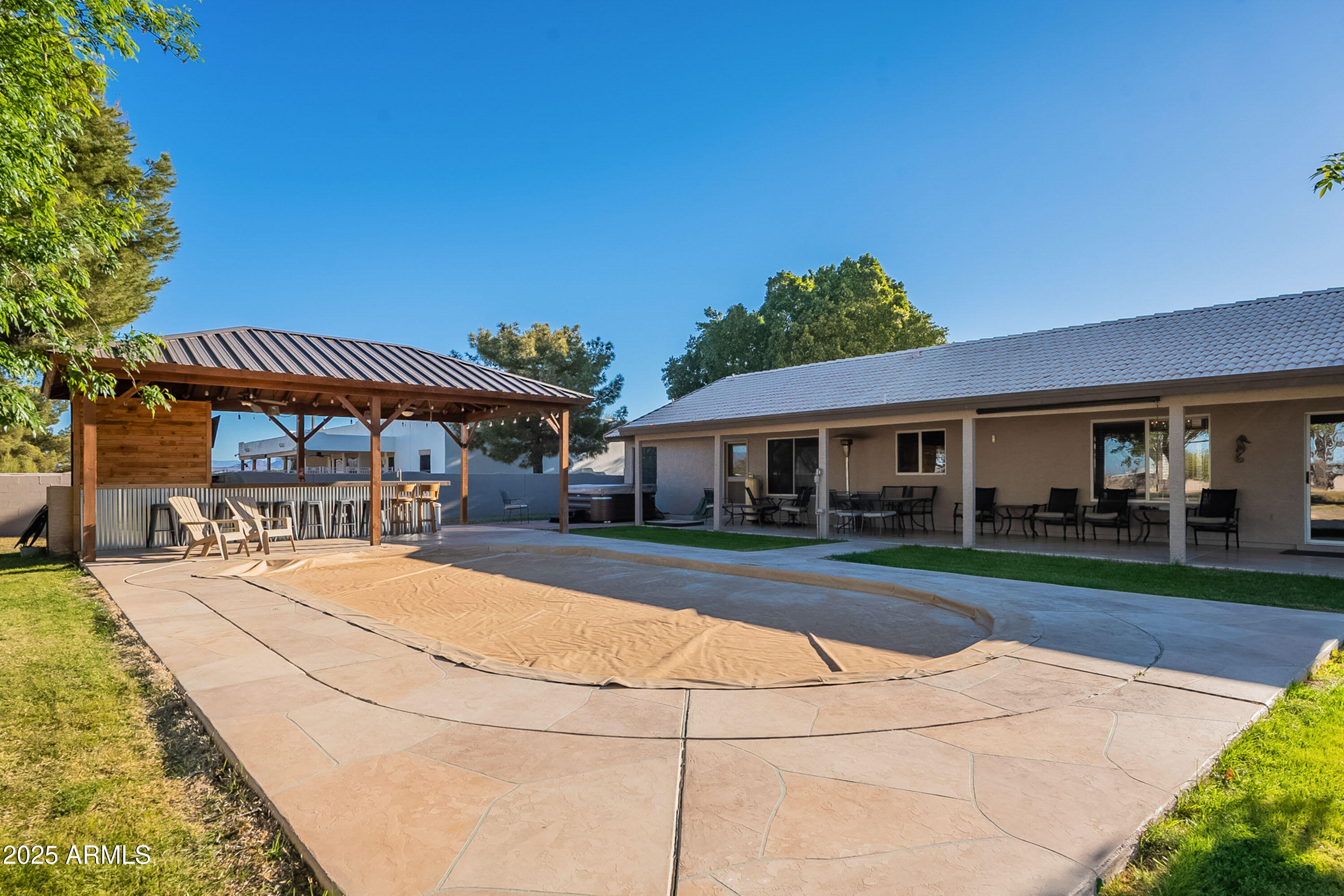 3464 North Ashbrook Mesa, AZ 85213 - Photo 61 of 63 a front view of a house with a yard