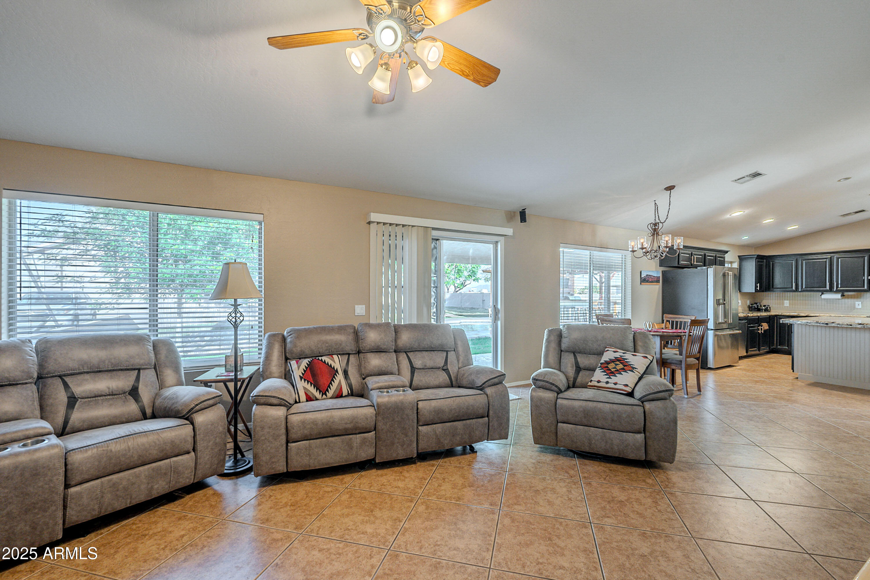 3464 North Ashbrook Mesa, AZ 85213 - Photo 9 of 63 a living room with furniture and a large window