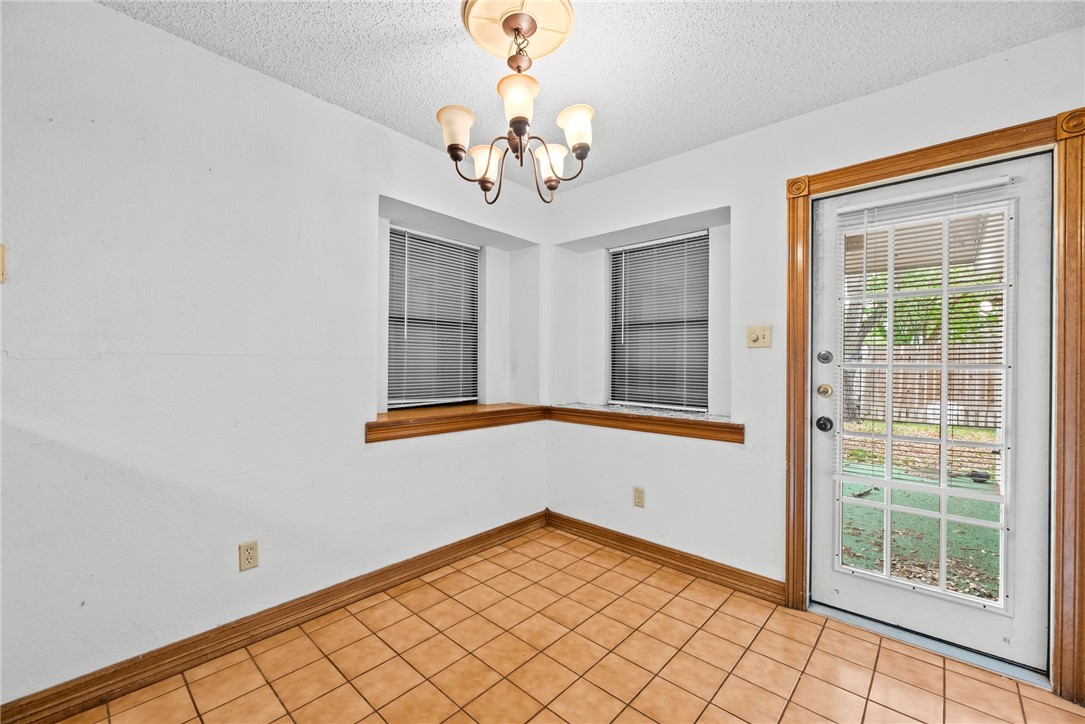5309 Timbergate Drive Corpus Christi, TX 78413 - Photo 19 of 29 a view of an empty room with a window