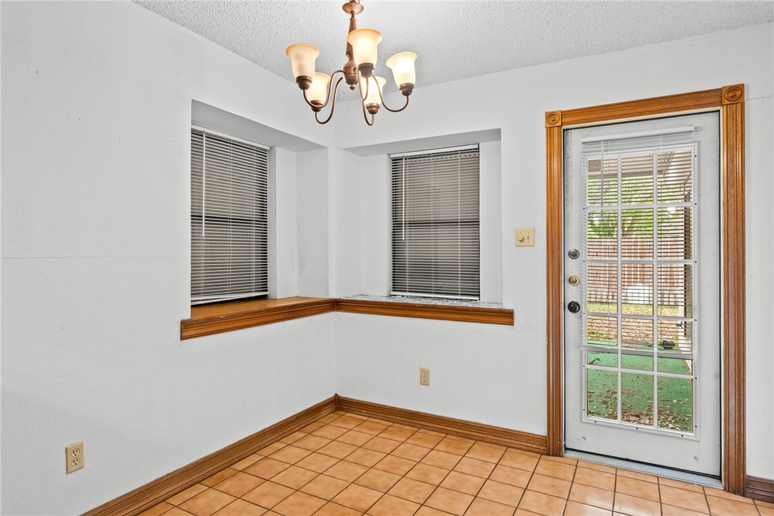 5309 Timbergate Drive Corpus Christi, TX 78413 - Photo 20 of 29 a view of an empty room with a window