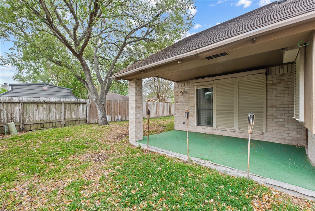 5309 Timbergate Drive Corpus Christi, TX 78413 - Photo 28 of 29 a view of a house with backyard and porch
