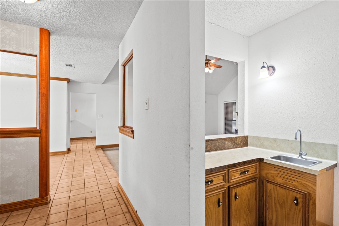 5309 Timbergate Drive Corpus Christi, TX 78413 - Photo 7 of 29 a view of a kitchen from the hallway