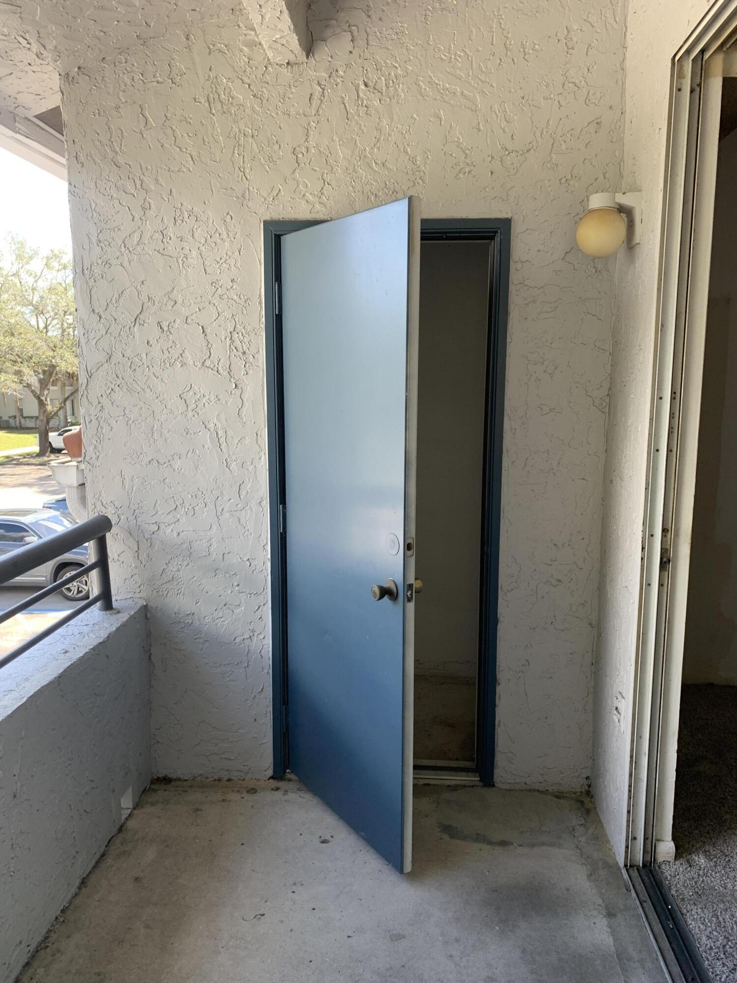 651 Lyons Road, Unit 10207 Coconut Creek, FL 33063 - Photo 34 of 38 a view of a storage & utility room