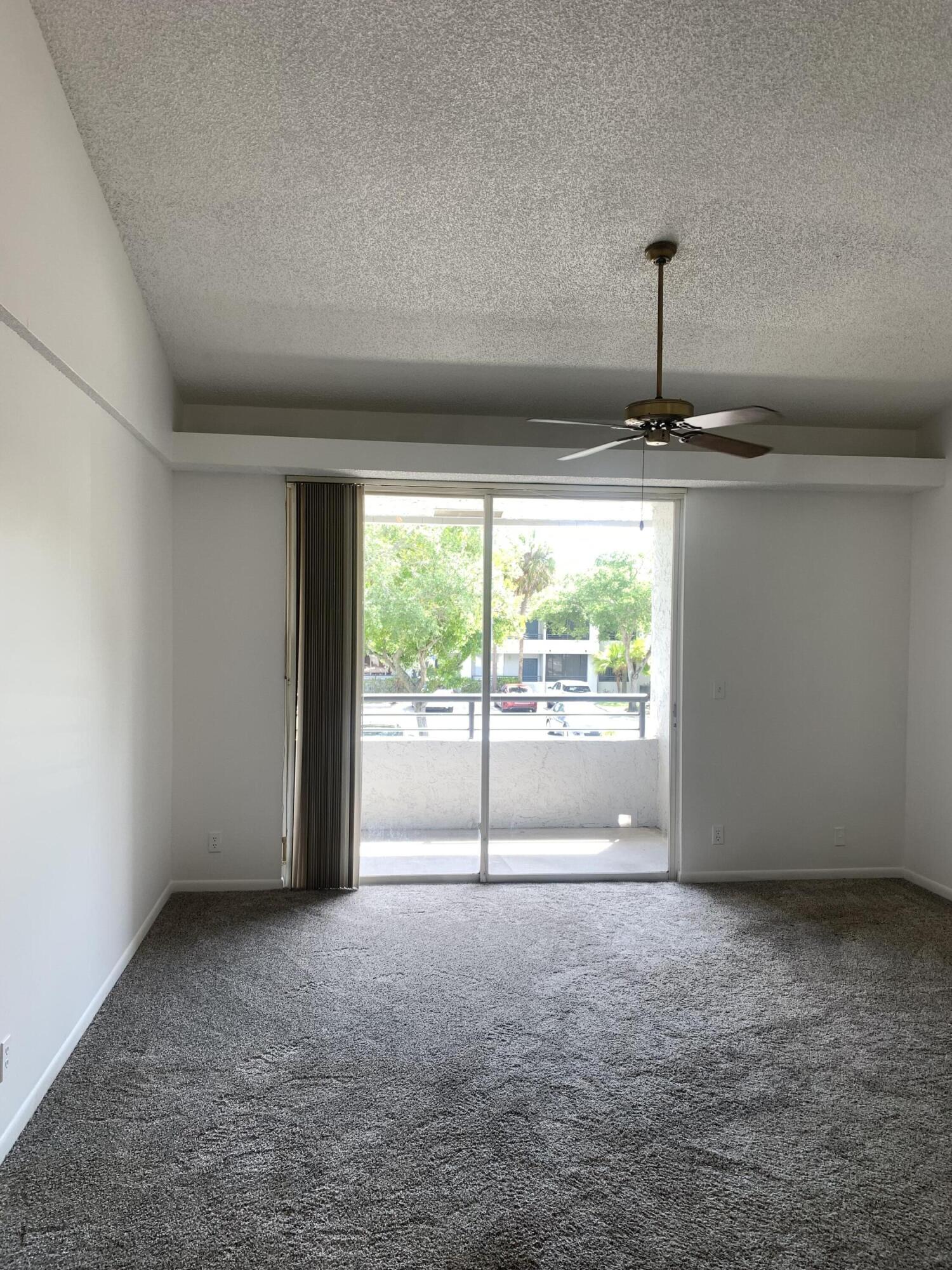 651 Lyons Road, Unit 10207 Coconut Creek, FL 33063 - Photo 7 of 38 View from dining room facing the living
