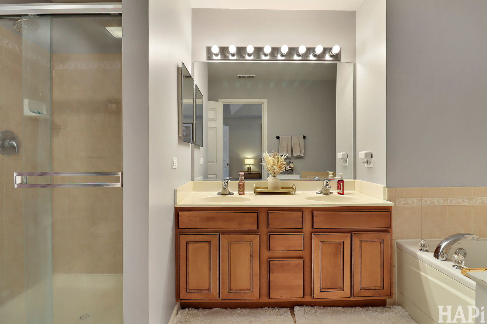 2154 Daybreak Drive Lake In The Hills, IL 60156 - Photo 19 of 29 a bathroom with a sink and a mirror