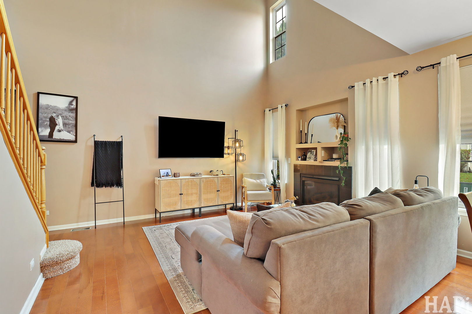 2154 Daybreak Drive Lake In The Hills, IL 60156 - Photo 5 of 29 a living room with furniture and a flat screen tv