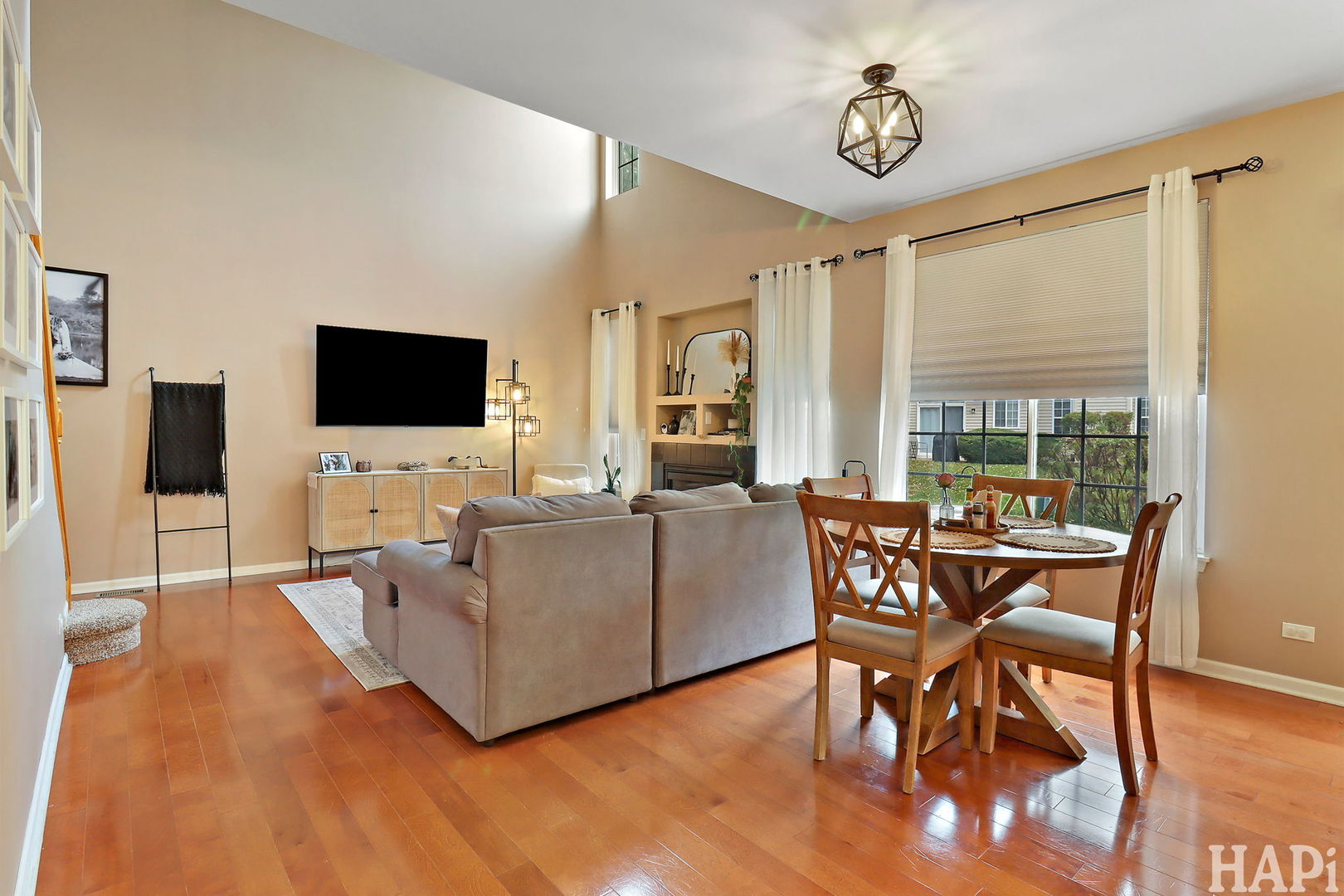 2154 Daybreak Drive Lake In The Hills, IL 60156 - Photo 8 of 29 a living room with furniture and a flat screen tv