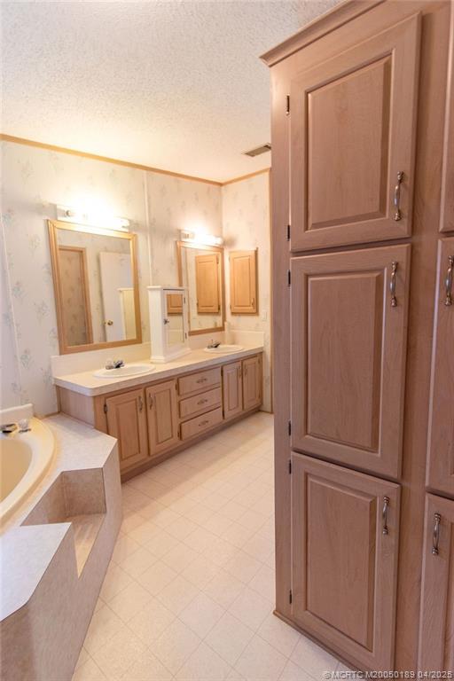 2500 Southwest Marquis Terrace Stuart, FL 34997 - Photo 19 of 20 a large white tub with white walls