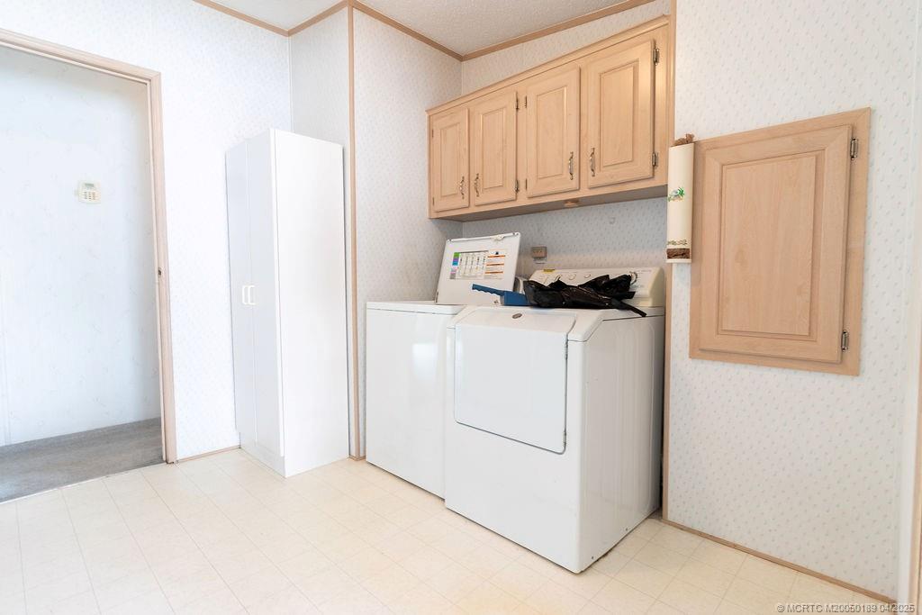 2500 Southwest Marquis Terrace Stuart, FL 34997 - Photo 9 of 20 a view of a kitchen with appliances