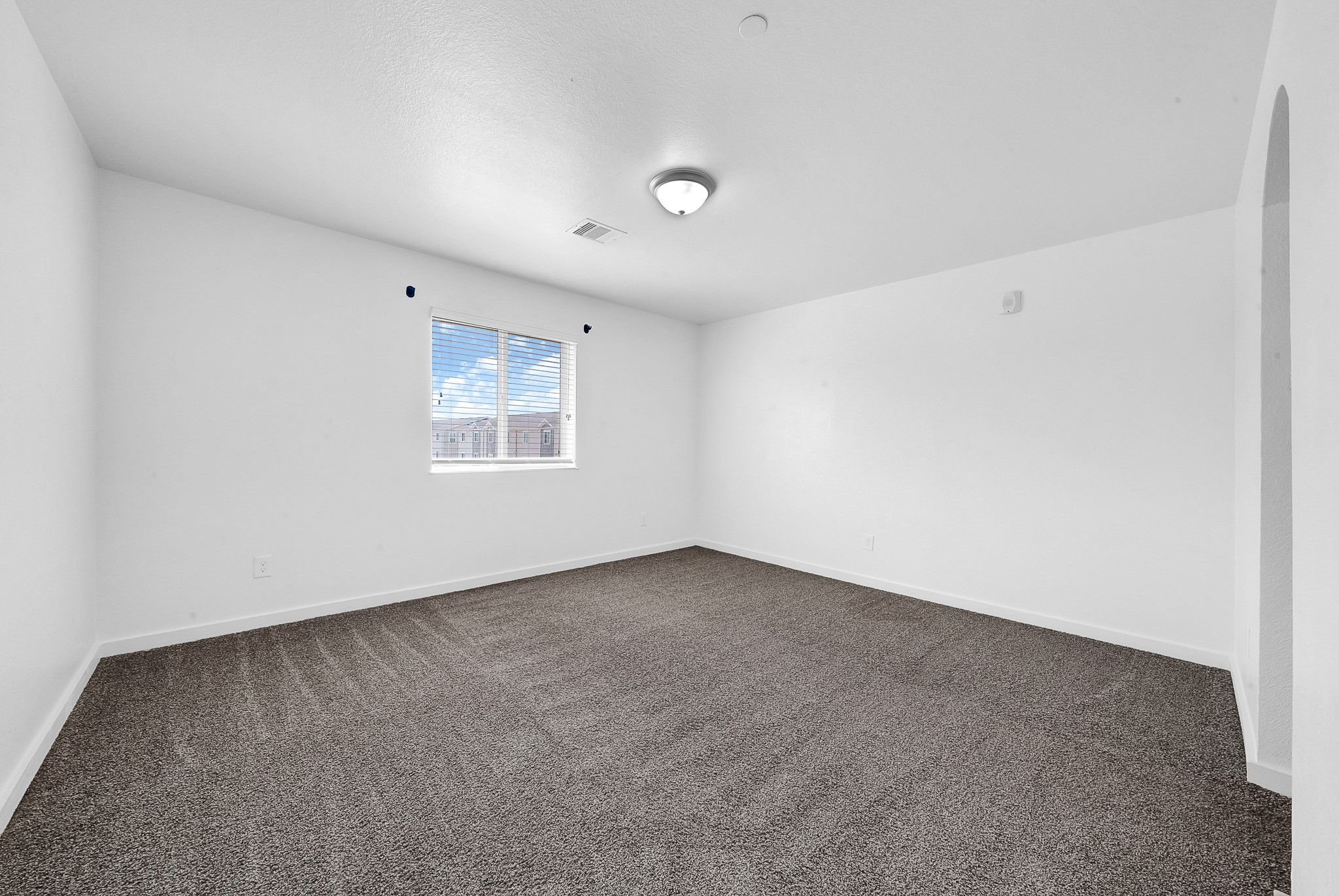21155 Gosling Road, Unit 24B Spring, TX 77388 - Photo 19 of 23 an empty room with a window