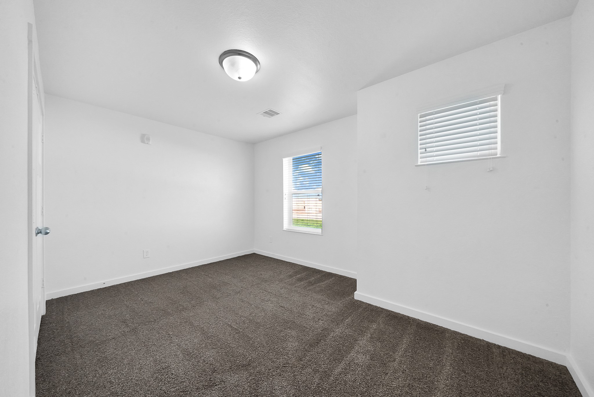 21155 Gosling Road, Unit 24B Spring, TX 77388 - Photo 21 of 23 an empty room with a window