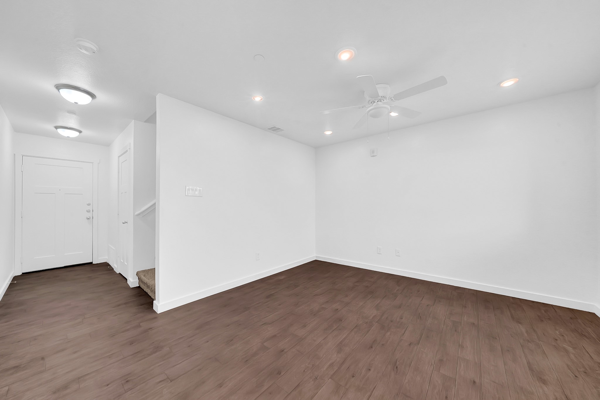 21155 Gosling Road, Unit 24B Spring, TX 77388 - Photo 5 of 23 an empty room with wooden floor and windows