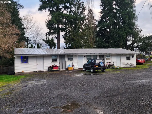a view of a car in front of house