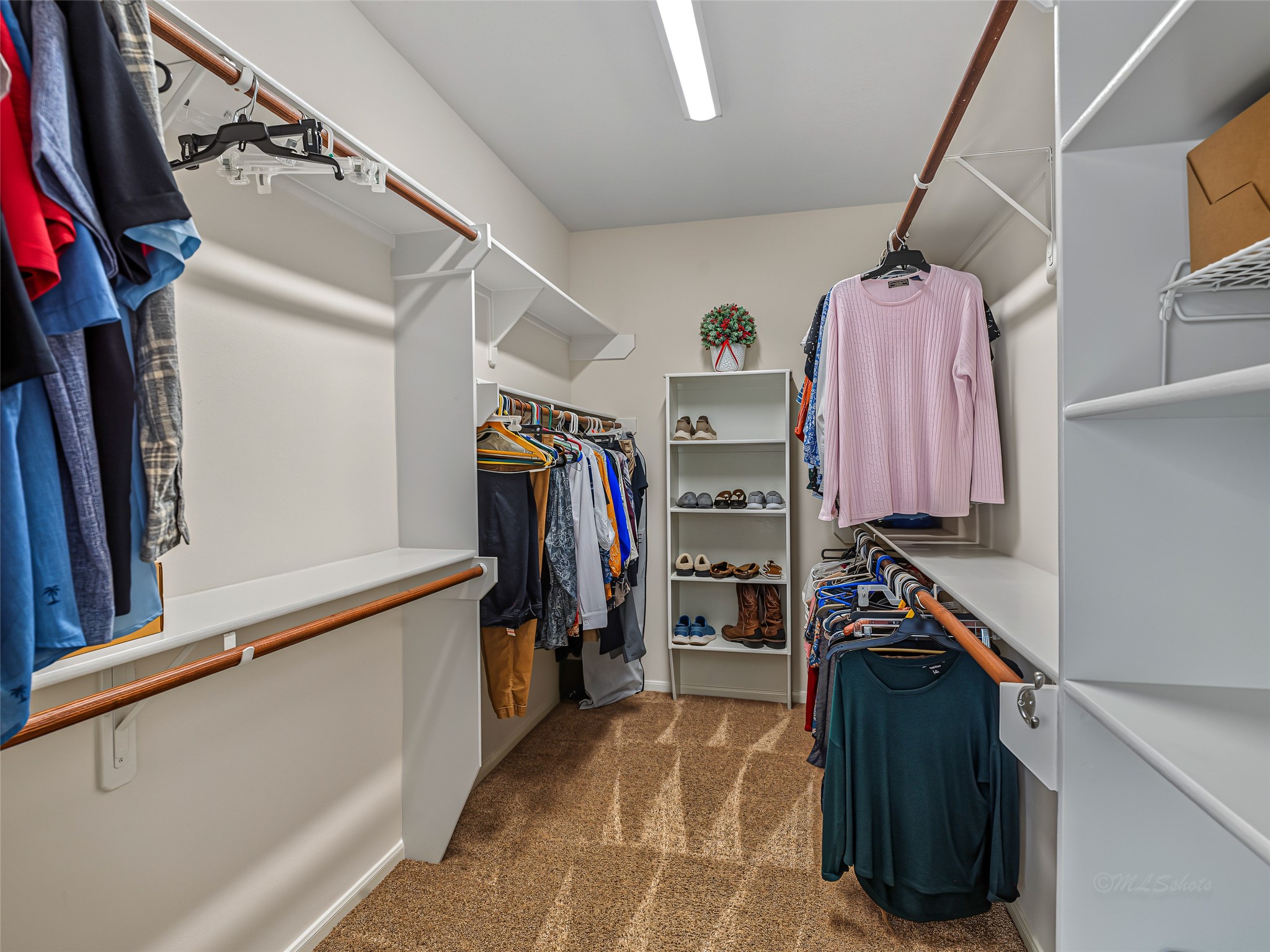 2210 Fox Path Katy, TX 77494 - Photo 29 of 47 This exceptionally sized walk-In closet is fully optimized with custom organization systems to maximize storage and efficiency.