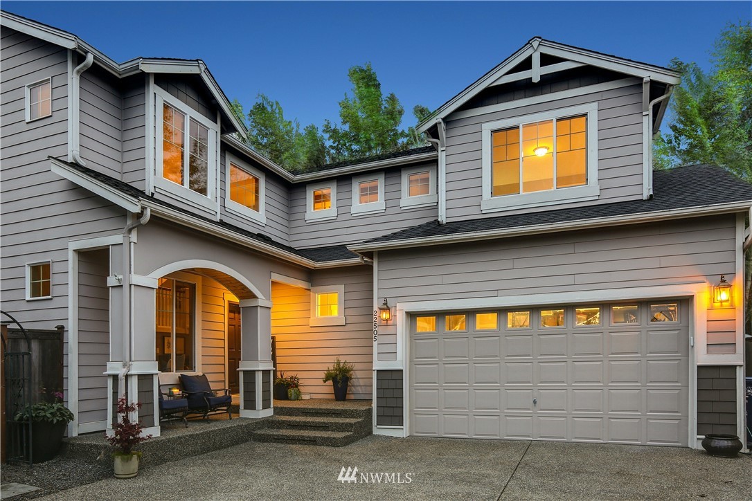 22505 38th Avenue Southeast Bothell, WA 98021 - Photo 1 of 39 a front view of a house with a yard