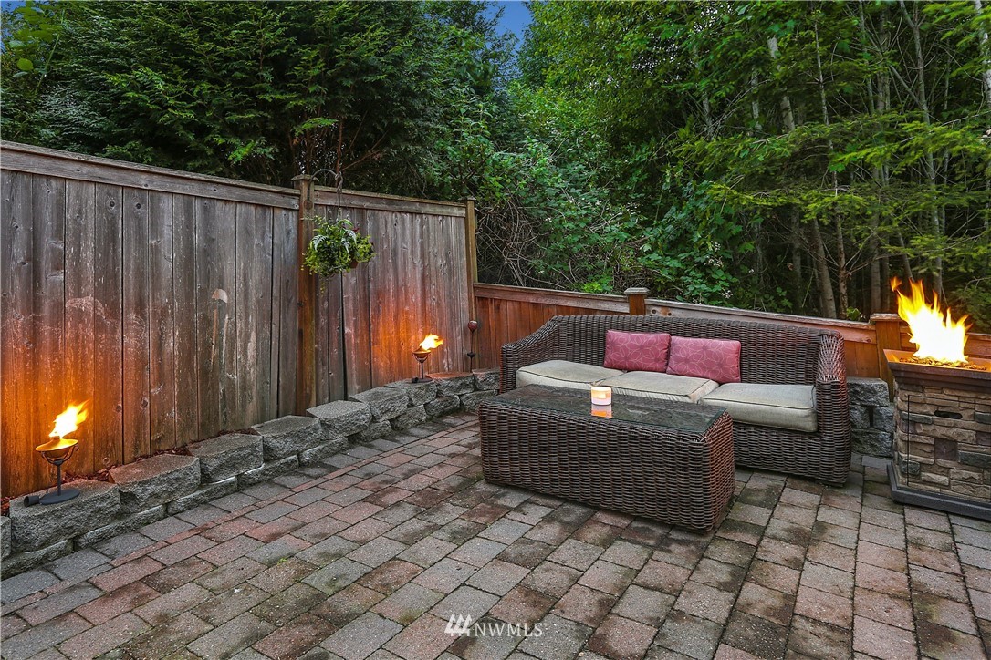 22505 38th Avenue Southeast Bothell, WA 98021 - Photo 30 of 39 a sitting area with furniture and wooden fence