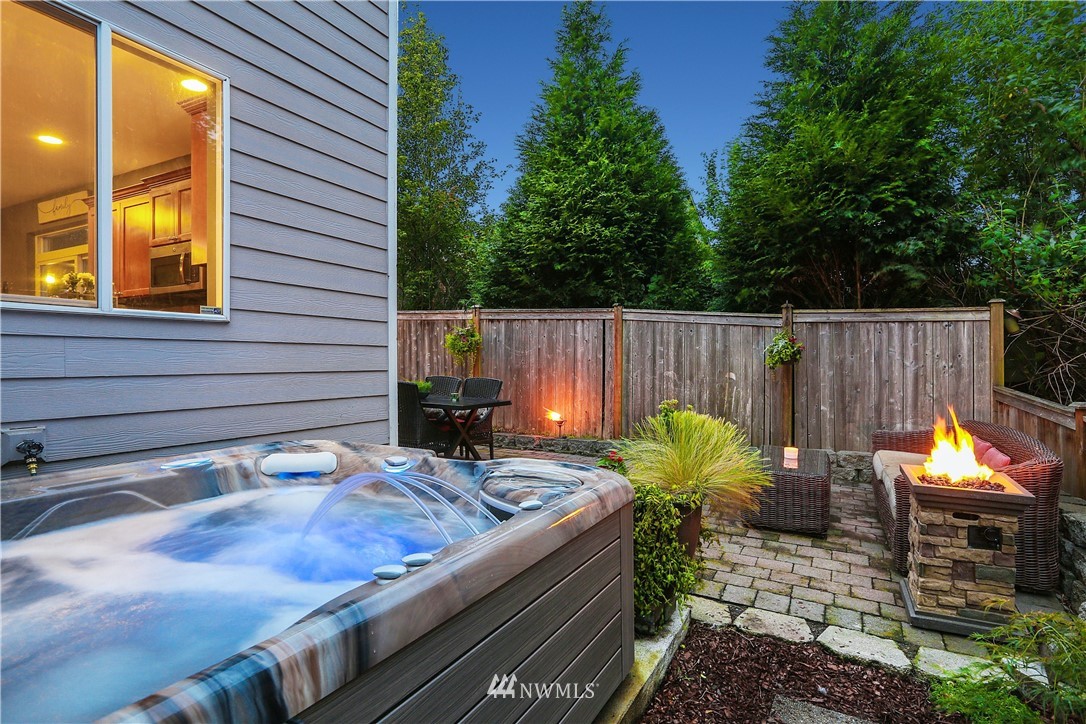 22505 38th Avenue Southeast Bothell, WA 98021 - Photo 31 of 39 a view of a chairs and table in the patio