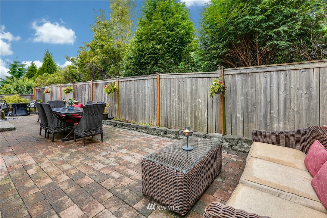 22505 38th Avenue Southeast Bothell, WA 98021 - Photo 38 of 39 an outdoor sitting area with couch and chairs