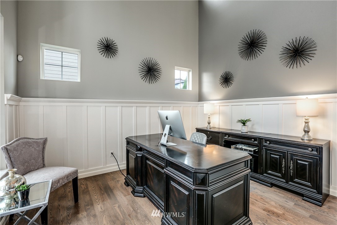 22505 38th Avenue Southeast Bothell, WA 98021 - Photo 6 of 39 a kitchen with a stove and a wooden floor