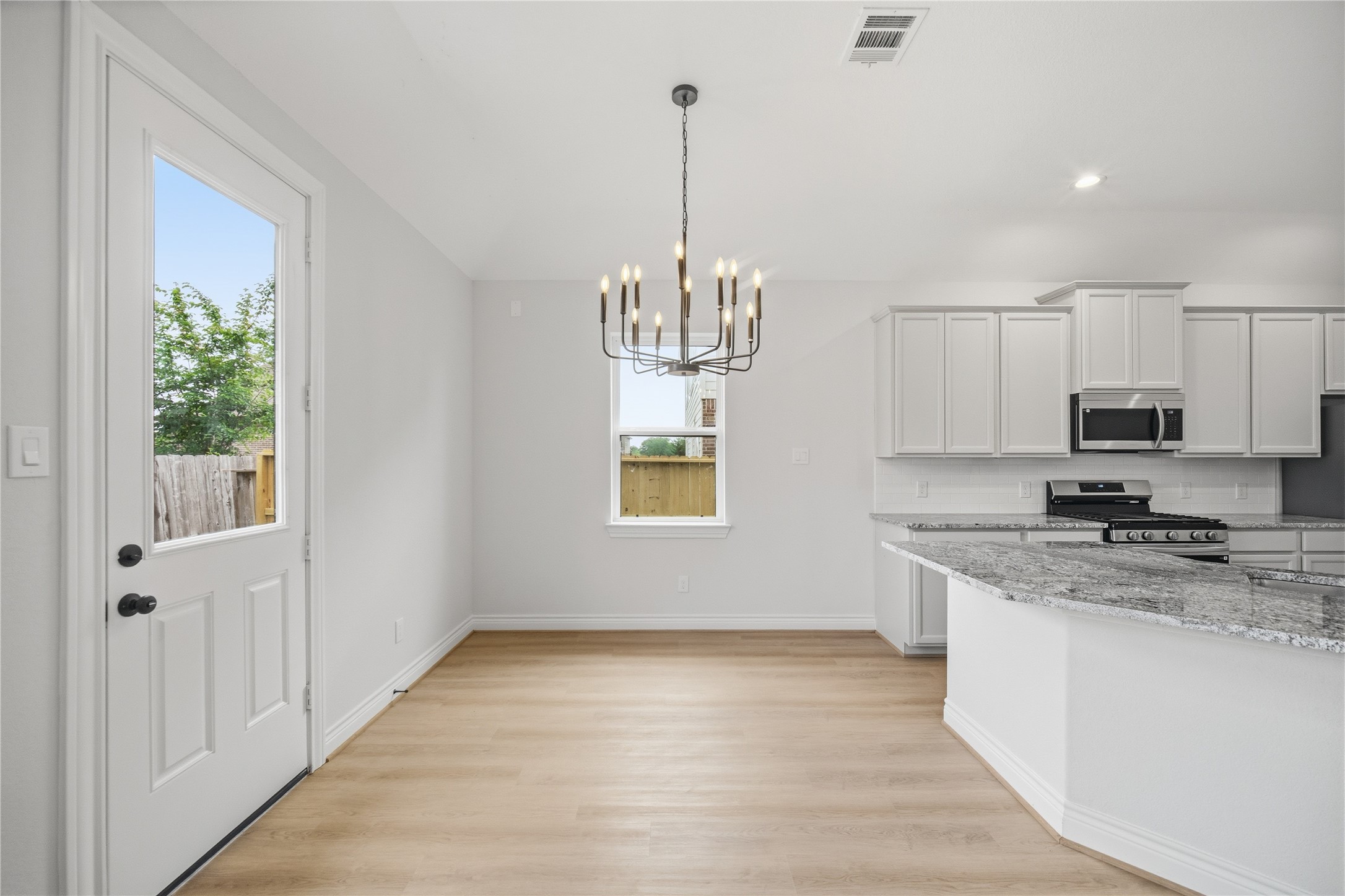 114 Par Circle La Porte, TX 77571 - Photo 11 of 33 The breakfast room overlooks the backyard and is filled with an abundance of natural light.
