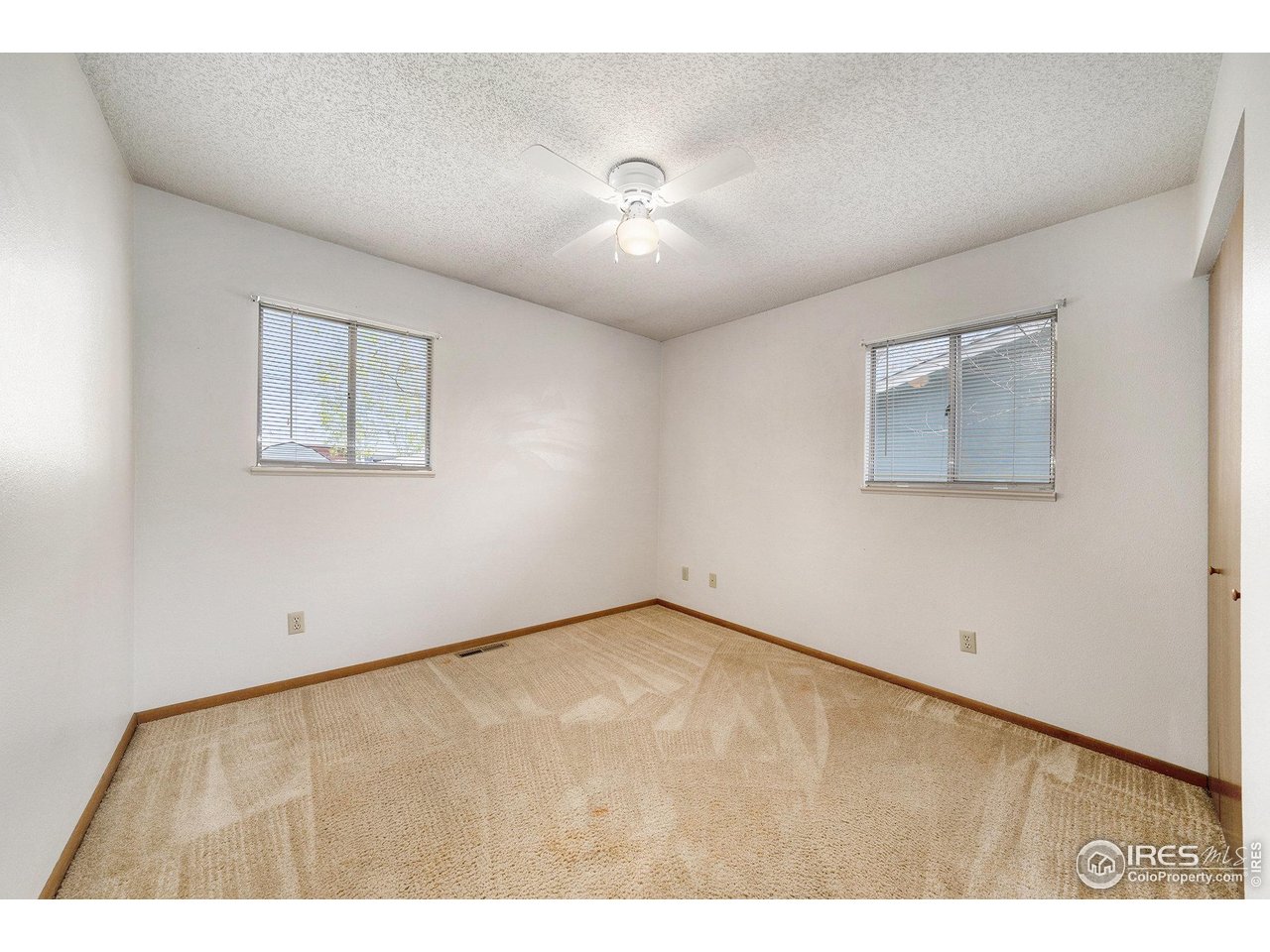 3237 West 5th St Road Greeley, CO 80634 - Photo 9 of 23 a view of an empty room
