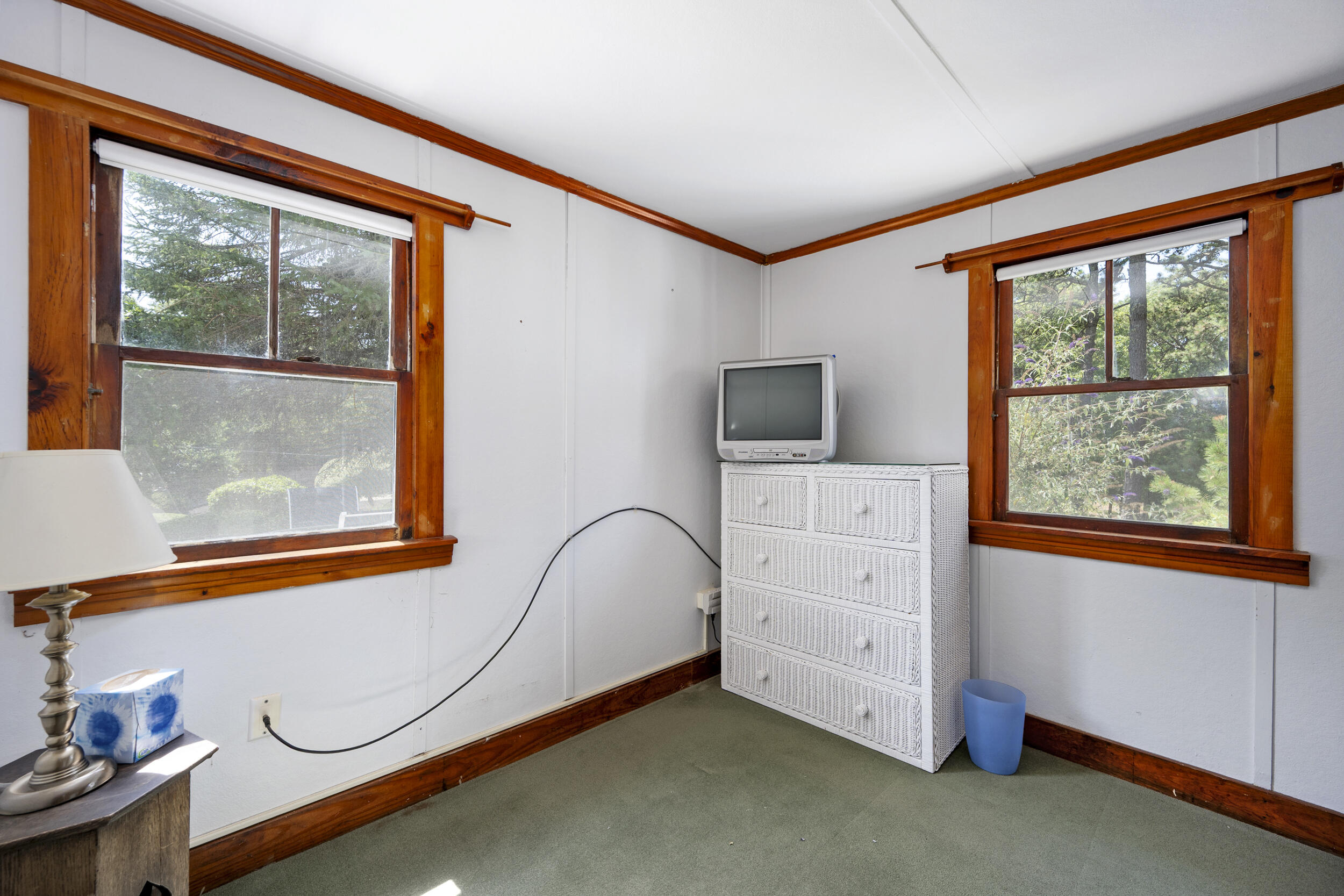 62 Old Fish House Road South Dennis, MA 02660 - Photo 13 of 24 a view of an empty room with a window and dresser