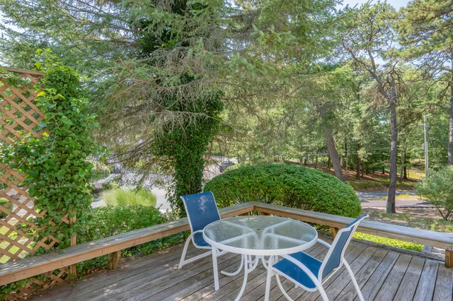 a view of a chairs and table in the outdoor space