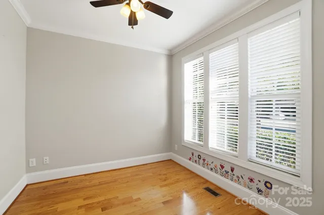 a view of an empty room and window