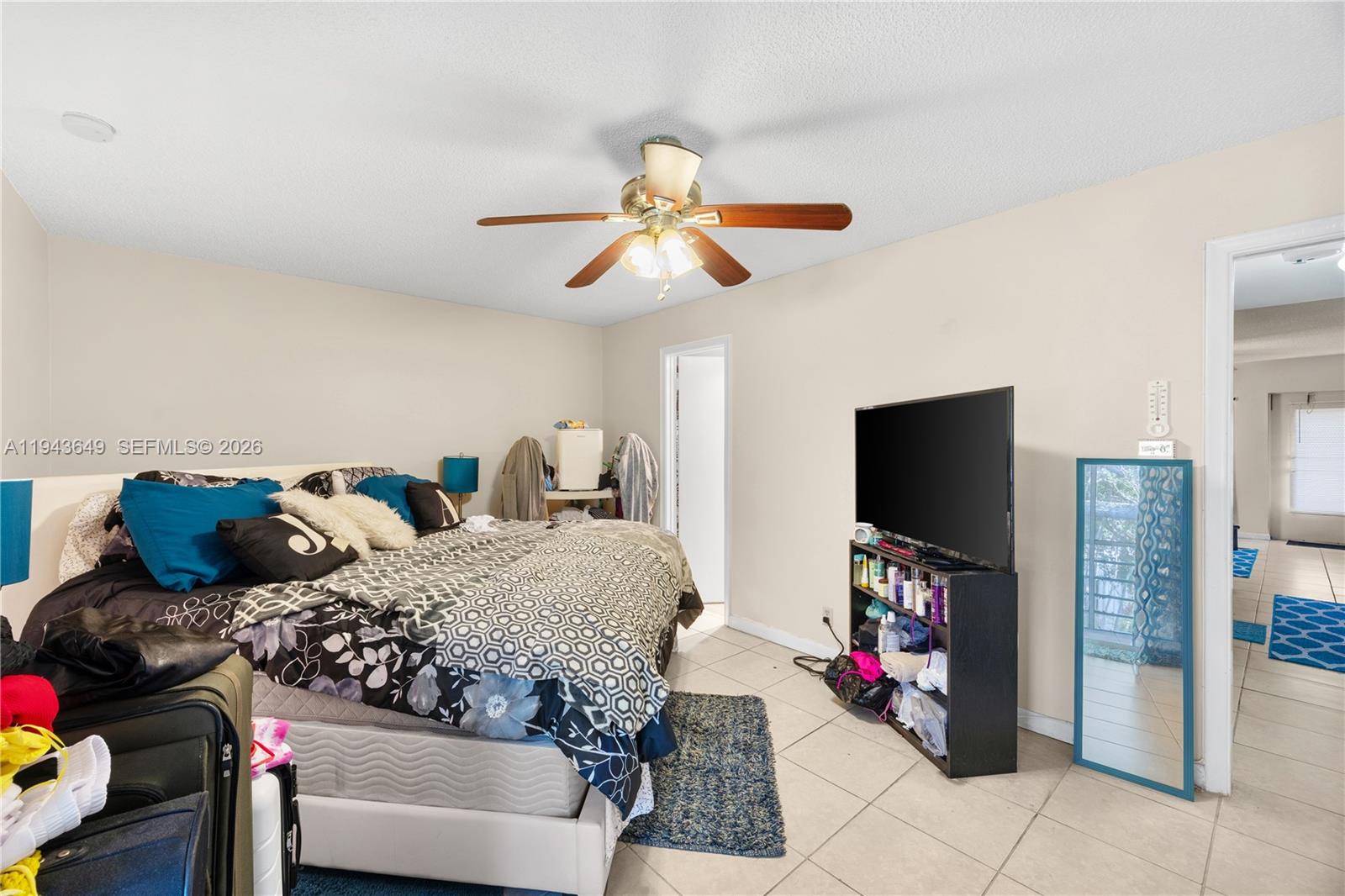 446 Durham O, Unit 446 Deerfield Beach, FL 33442 - Photo 14 of 26 a living room with furniture and a flat screen tv