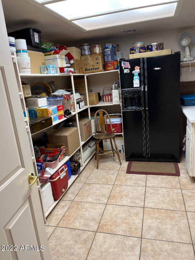 4680 North Tomahawk Road Apache Junction, AZ 85119 - Photo 22 of 25 shelves in laundry