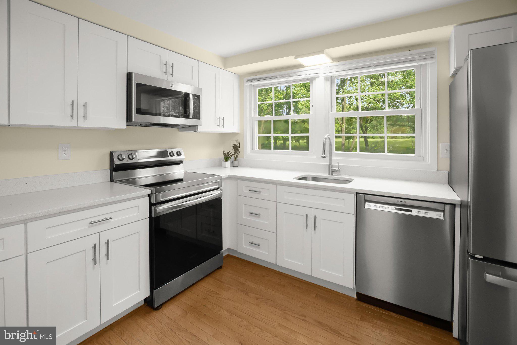 5174 Downwest Ride Columbia, MD 21044 - Photo 15 of 51 Built-in microwave & glass top range