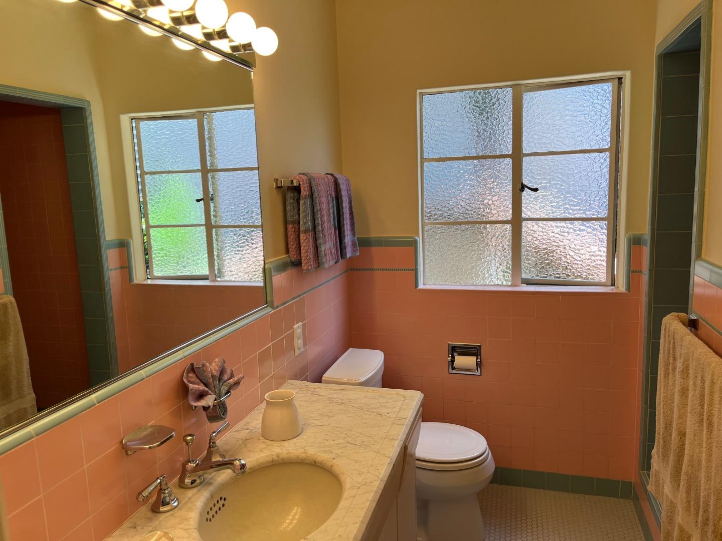 529 Monterey Drive Aptos, CA 95003 - Photo 25 of 32 a bathroom with a sink toilet and mirror