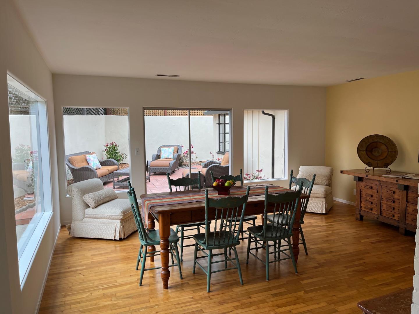 529 Monterey Drive Aptos, CA 95003 - Photo 9 of 32 a view of a dining room with furniture and wooden floor